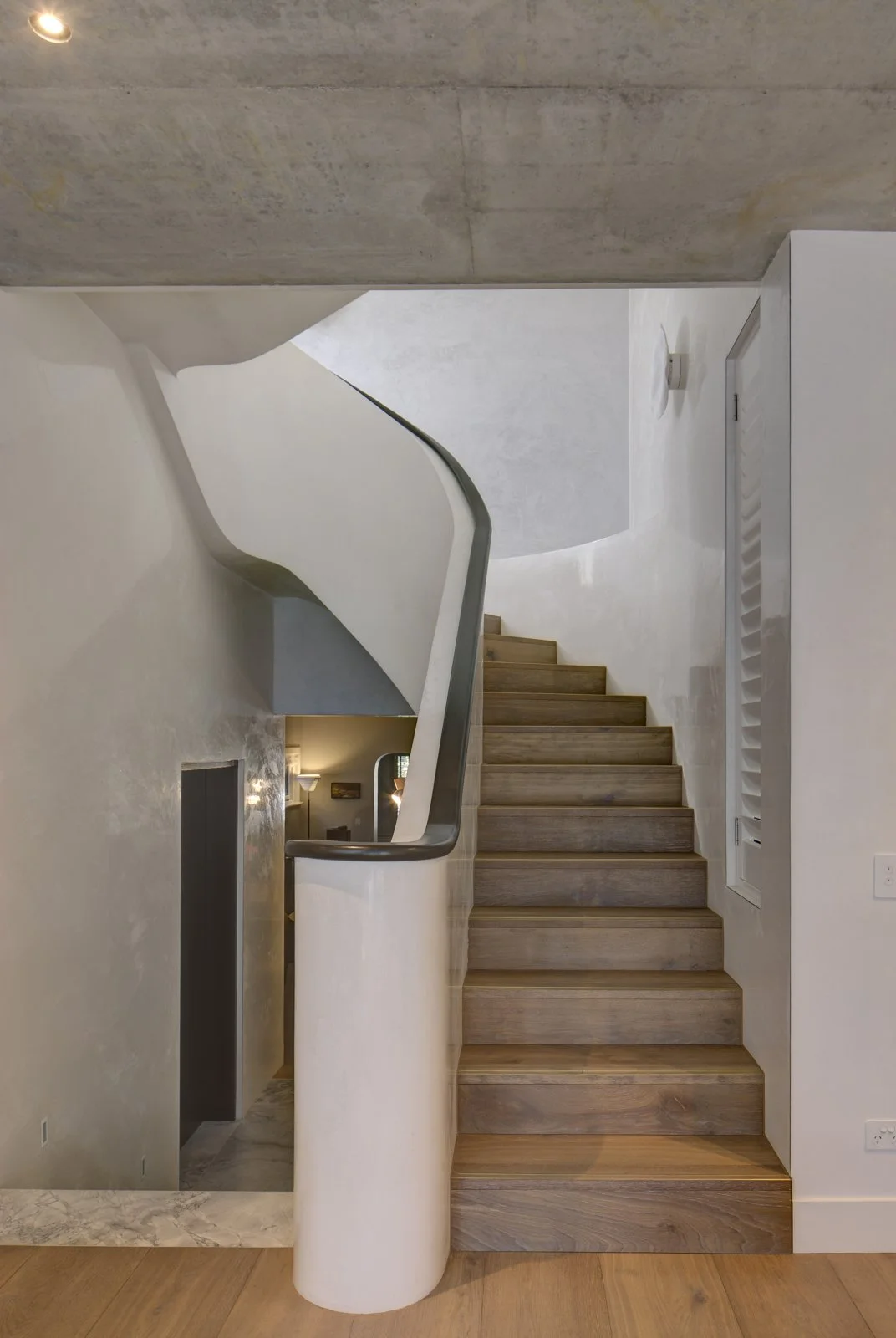 ribbon stairs, oak treads, continuous hand rail spiral staircase