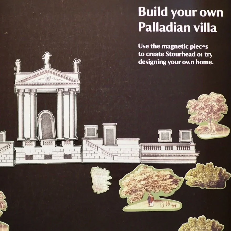  A blackboard covered in magnets depicting pieces of Palladian architecture.