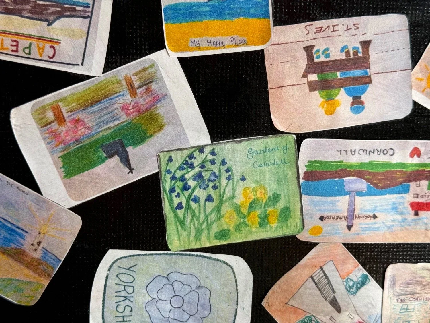 Hand-drawn stickers depicting images of Cornwall.