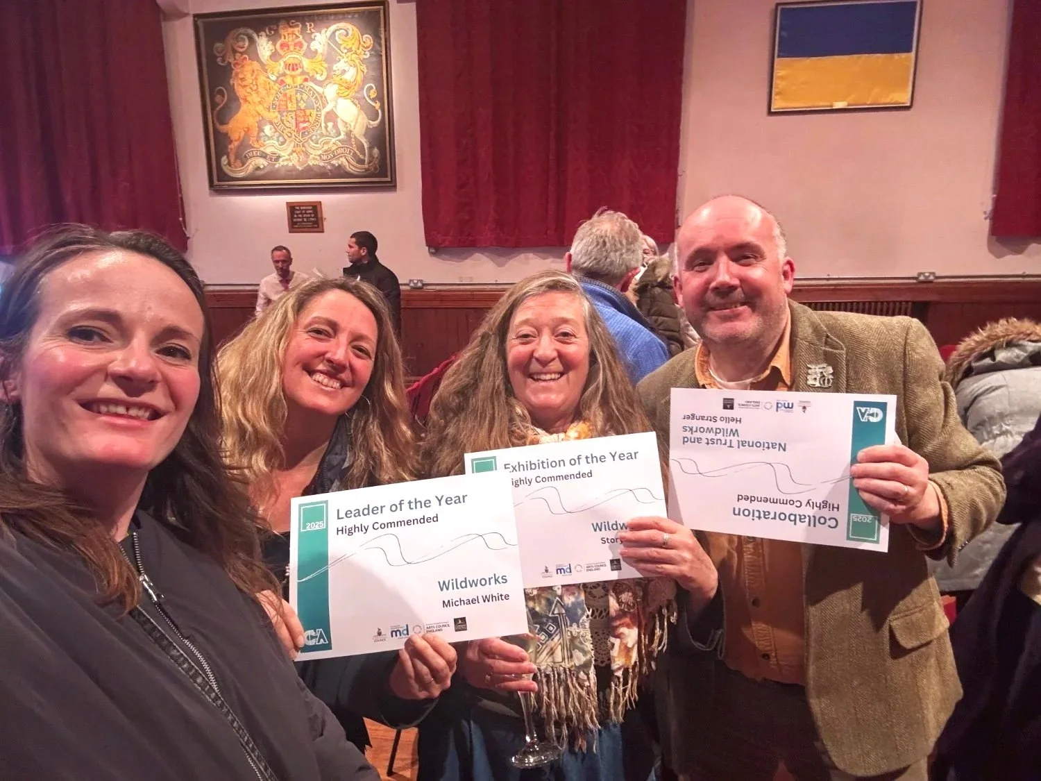 Camilla Forest with Wildworks and National Trust staff accept commendations at the Cornwall Heritage Awards.