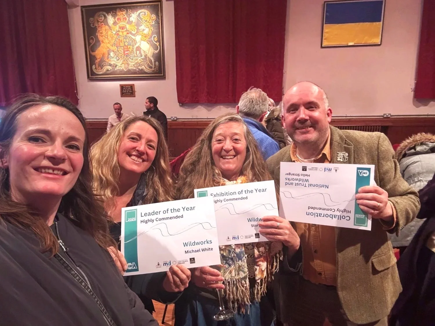 Camilla Forest with Wildworks and National Trust staff accept commendations at the Cornwall Heritage Awards.