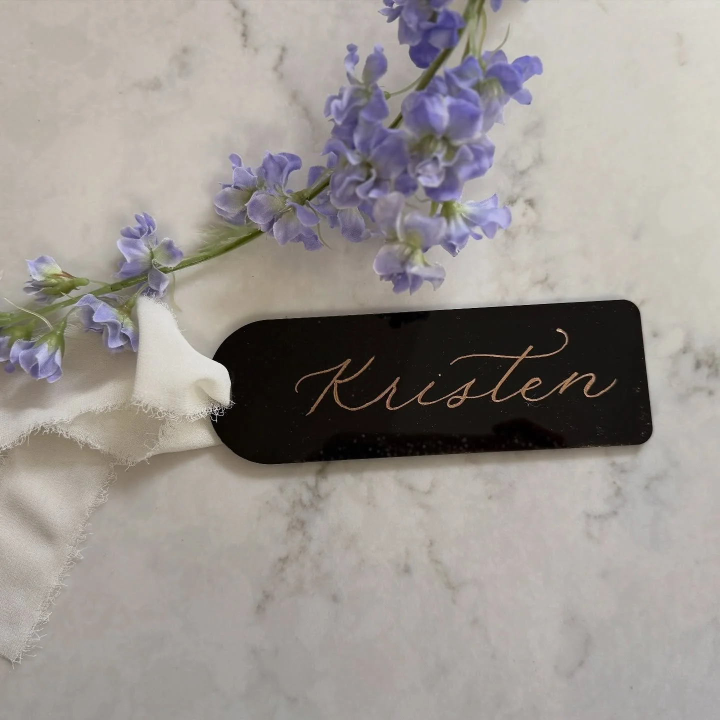 My sister-in-law, Kristen, has her own personal library; a space with over a thousand books, flowing from every corner of the room. Thoughtfully curated, every book she&rsquo;s collected is important to her. 

This engraved acrylic bookmark is the pe