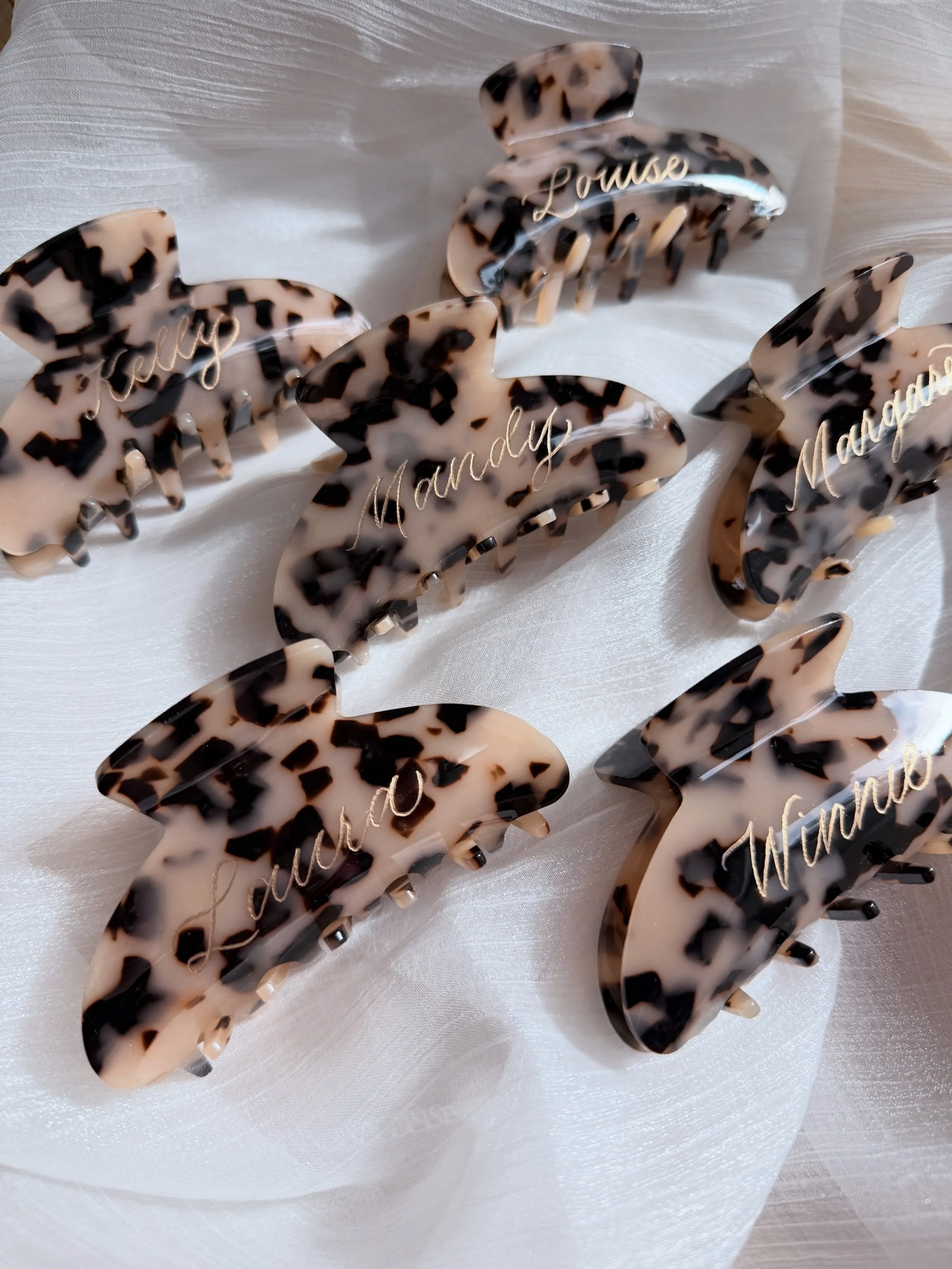 Personalized, engraved claw clips for a bachelorette party in Montauk ⚓️😍 

What I love about these lighter colored tortoise shell clips is that the engraving blends in a bit with the clip, and becomes more of a subtle little elegant detail, versus 