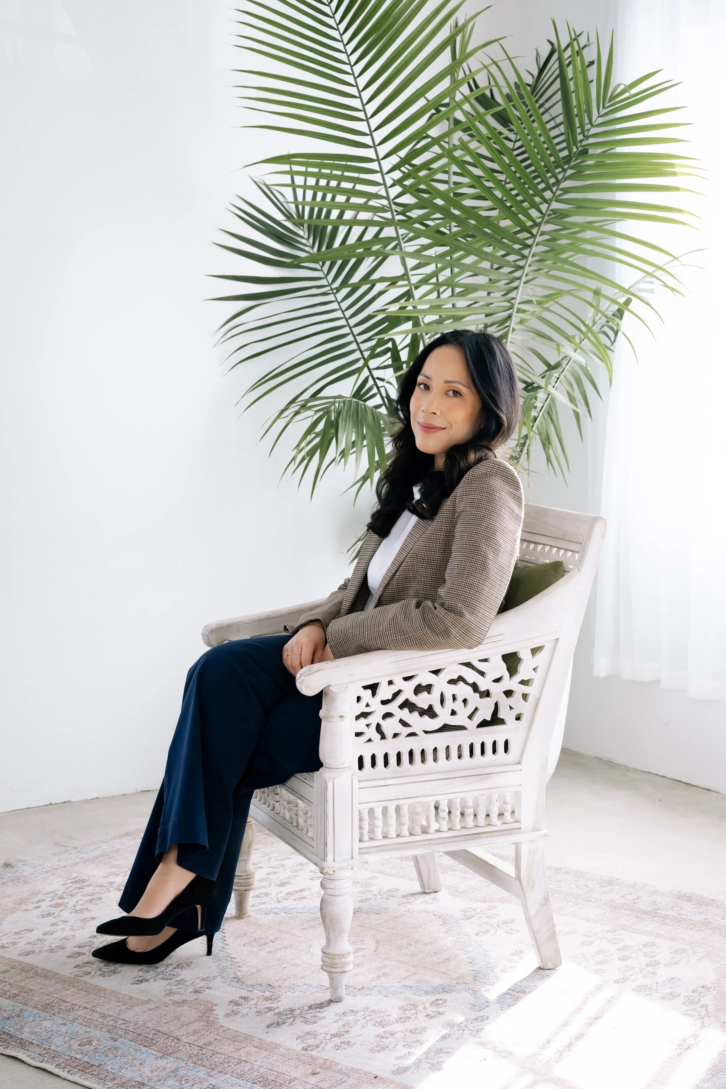 Portrait of New Jersey calligrapher and engraver Kaity Kwock of kwk creative studio specializing in luxury brand activations, live engraving, hot foiling, and modern calligraphy.