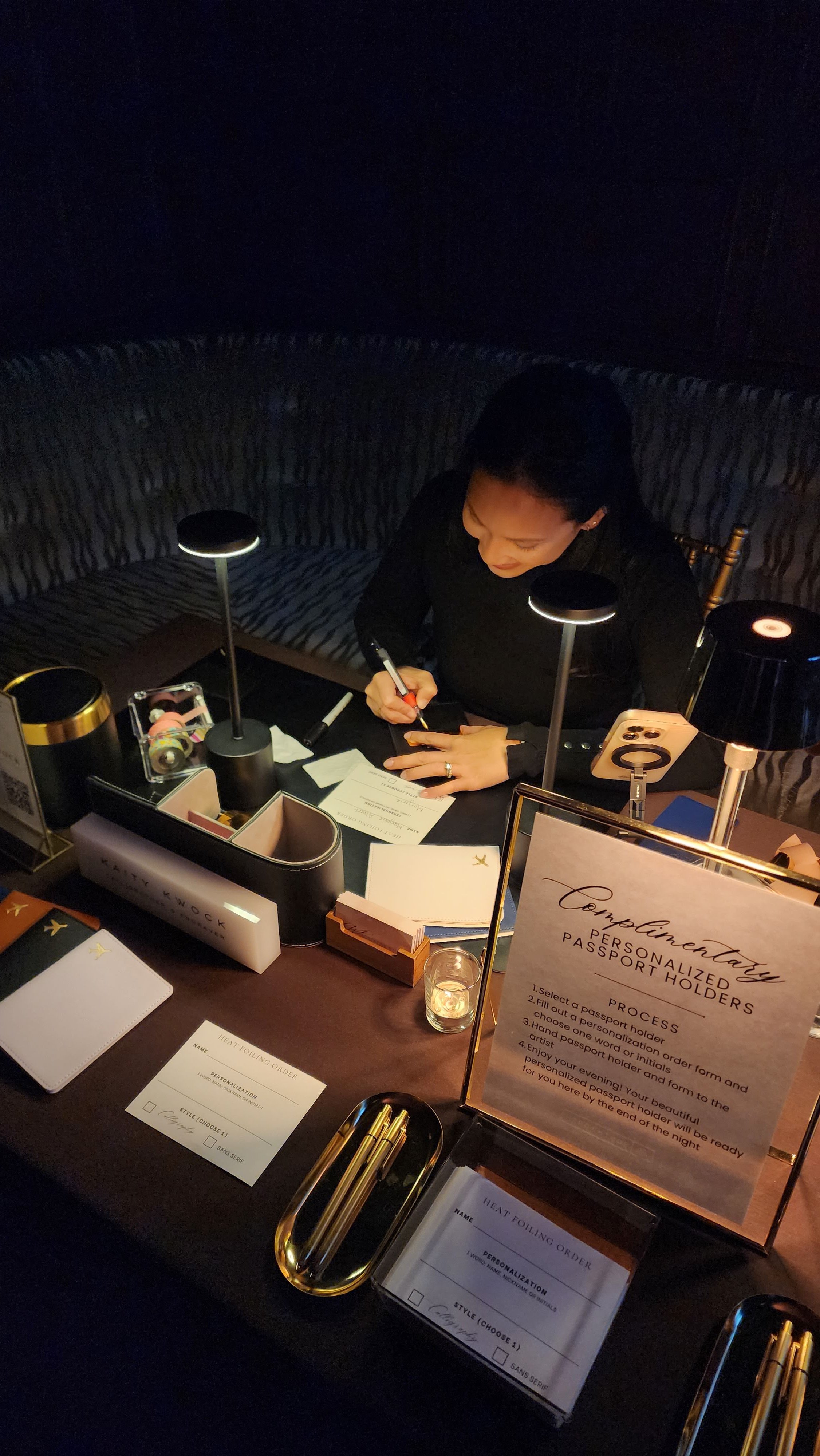 Live calligraphy and engraving at a luxury hospitality activation at The Plaza Hotel New York — KWK Creative Studio providing on-site personalization for hotel and corporate events in NYC