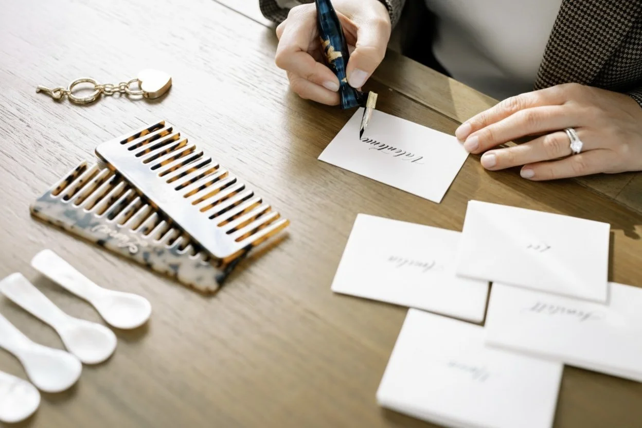 Live calligraphy place cards being written at a luxury event — professional calligrapher for weddings and corporate events in New York and New Jersey by KWK Creative Studio