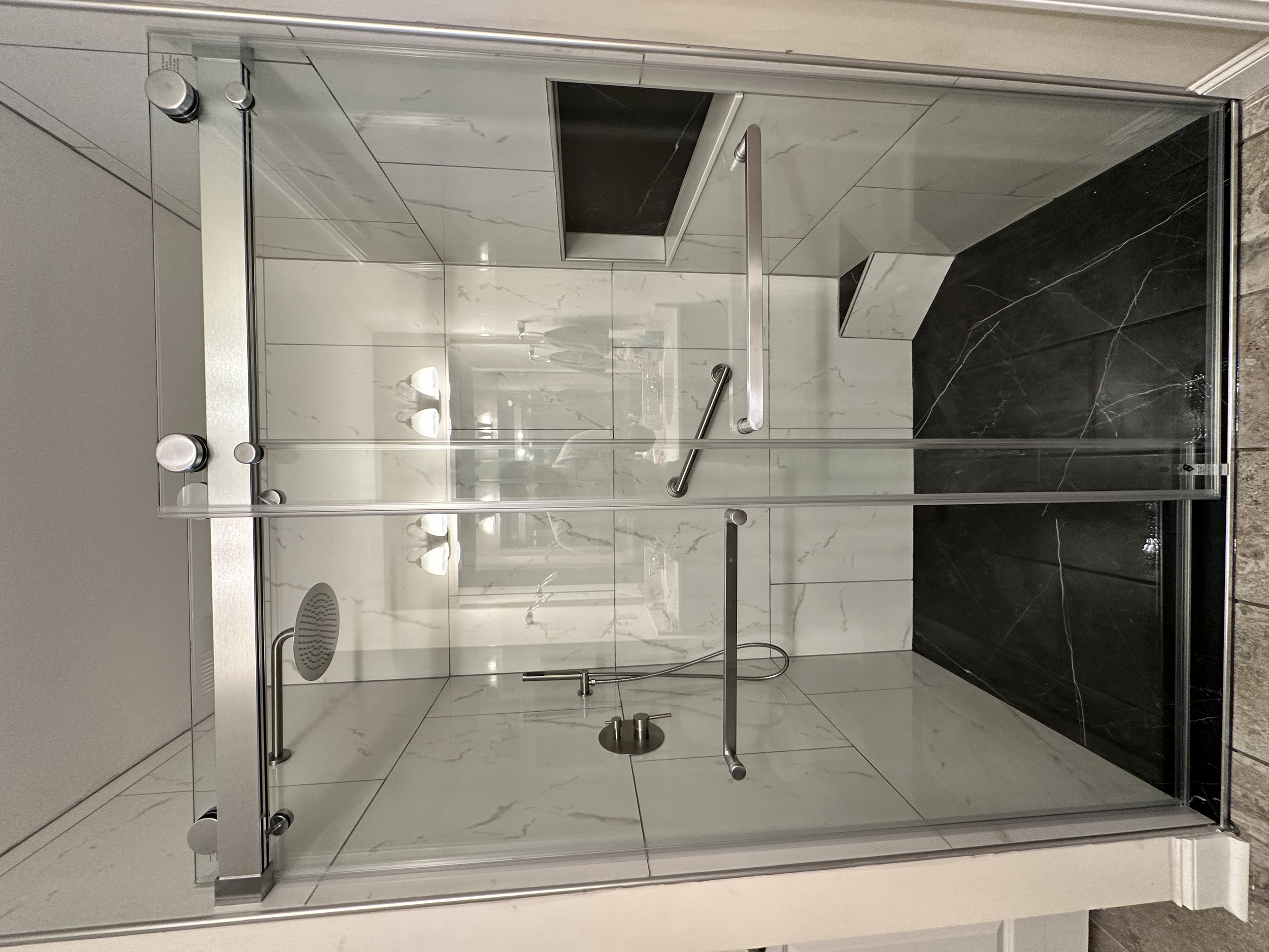 Here's the complete product, new sliding, soft-close shower door and curb-less shower.