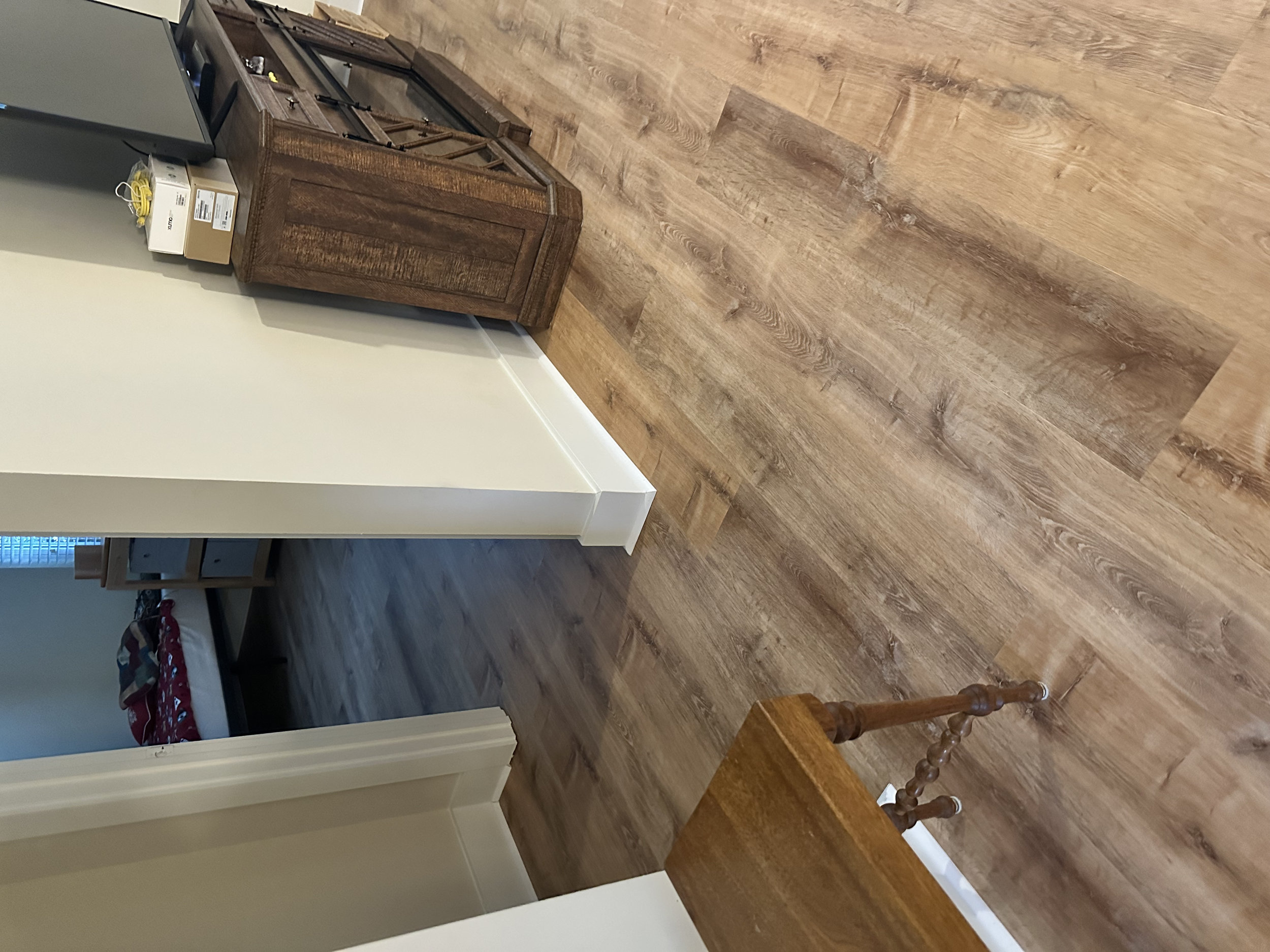 The LVP flooring was installed all through the first floor including the kitchen, downstairs office, and half bathroom