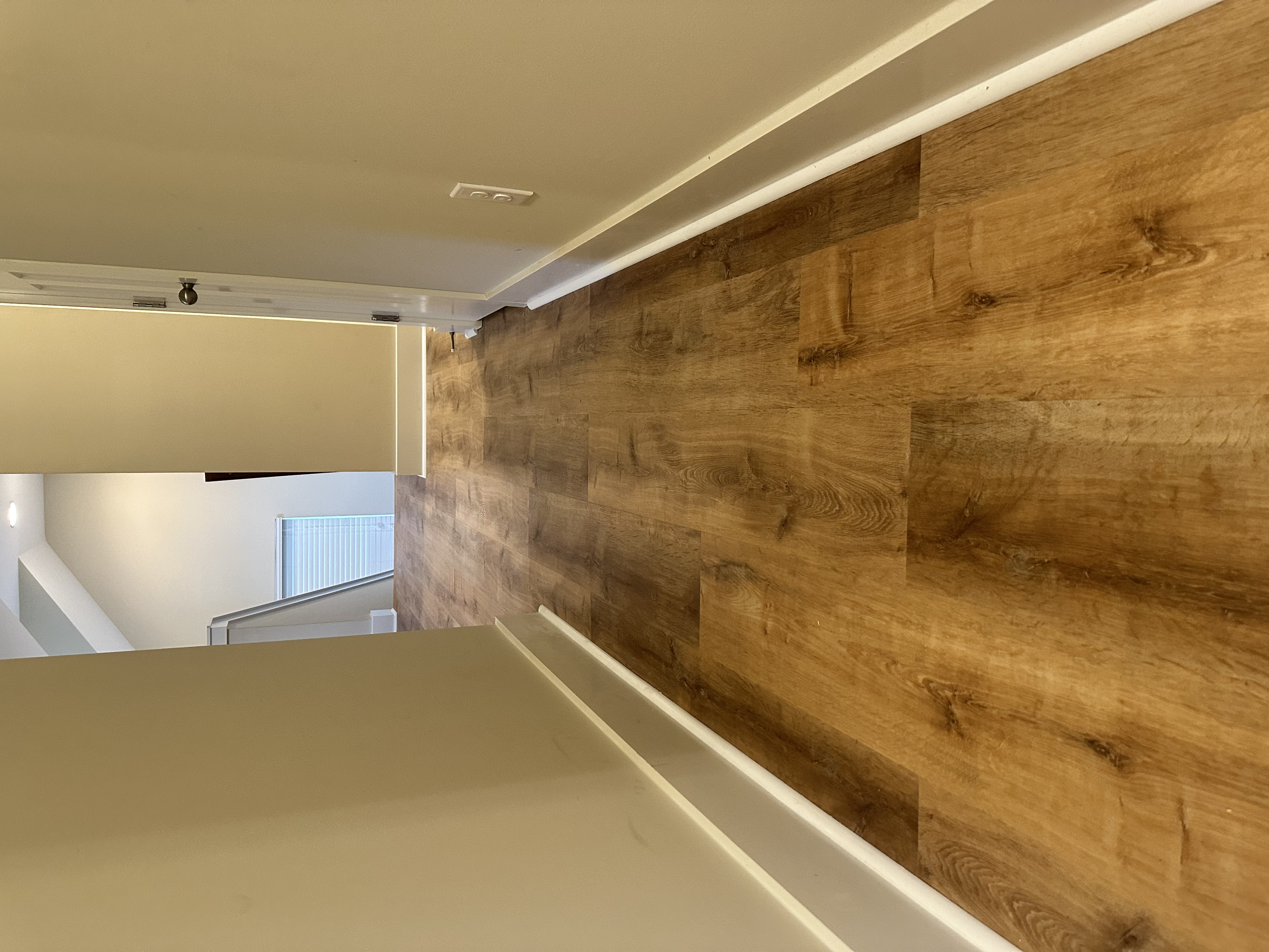 Down the hallway leading into the "book nook"