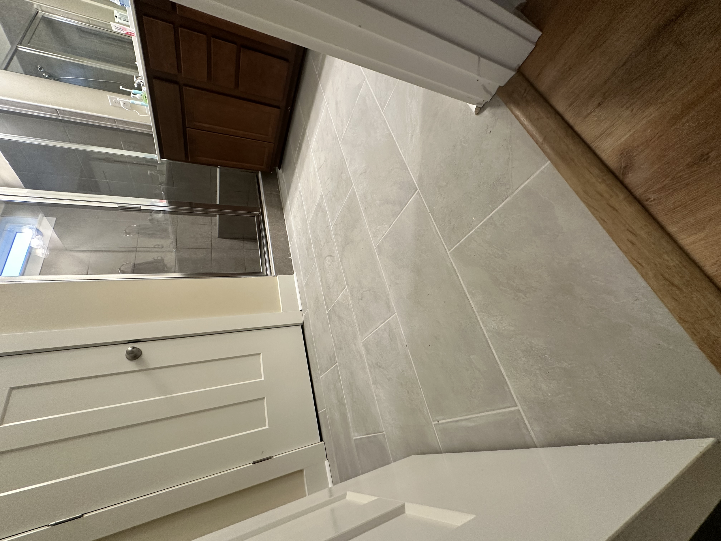 This is the master bathroom where we installed more 12x24 inch porcelain tile