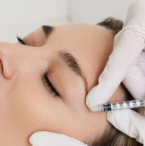 Botox injection treatment being performed on forehead at Ottawa medical aesthetics clinic