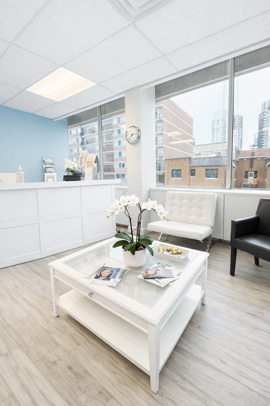 Modern and bright reception area at Apex Hair Restoration & Aesthetics clinic in Ottawa.
