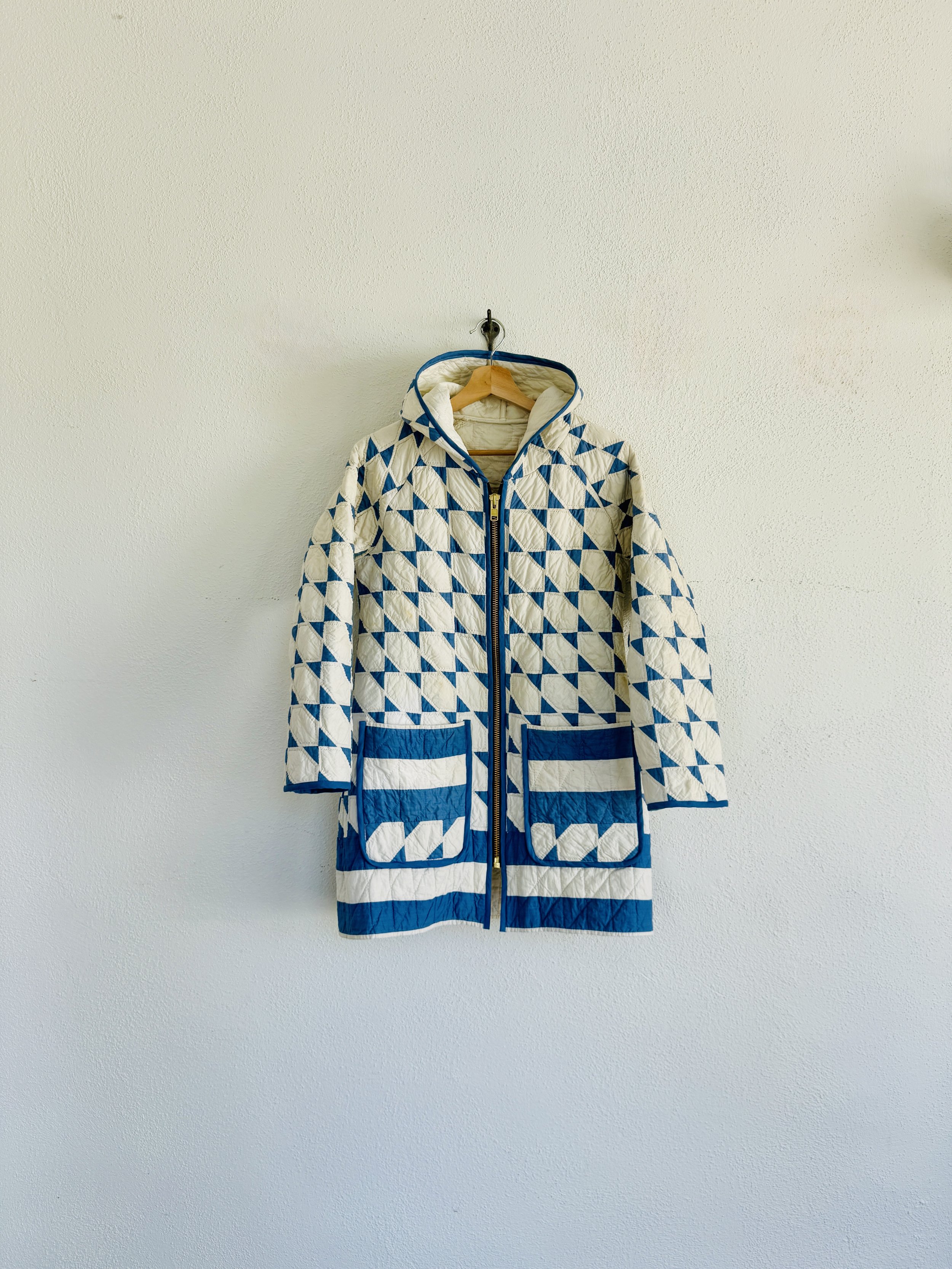 Gather Coat - adult: this coat has a relaxed fit with a cozy, roomy hood and can be fitted with a zipper or a button/snap placket.