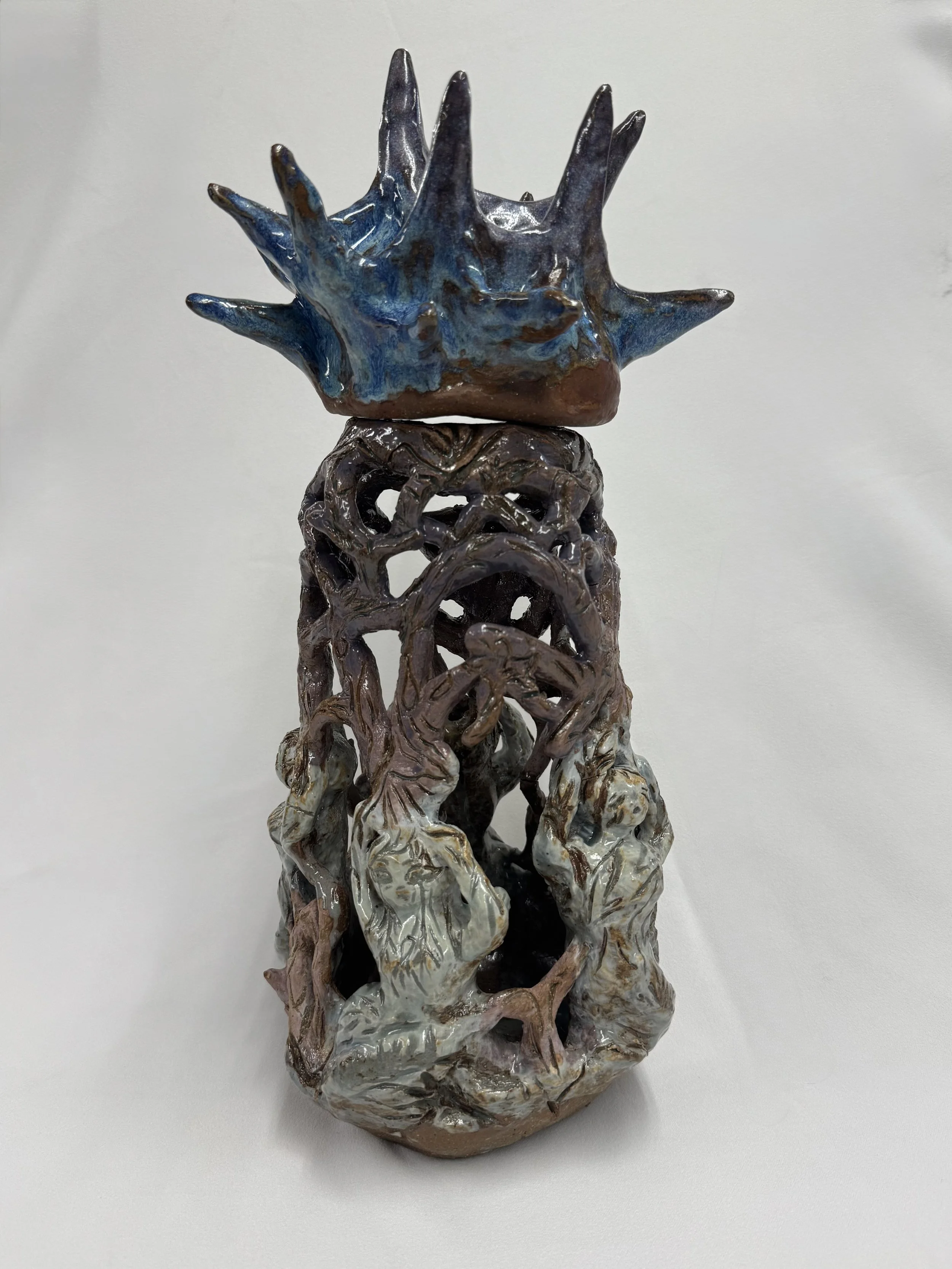 “Weight on your shoulders”, 2025
red stoneware clay with sgraffito and purple slip, celadon, purple haze, and blue cerrelium heaven glazes.
3" x 11" inches. 
The heavy and hard expectations being weighed on upon your shoulders while holding on to you