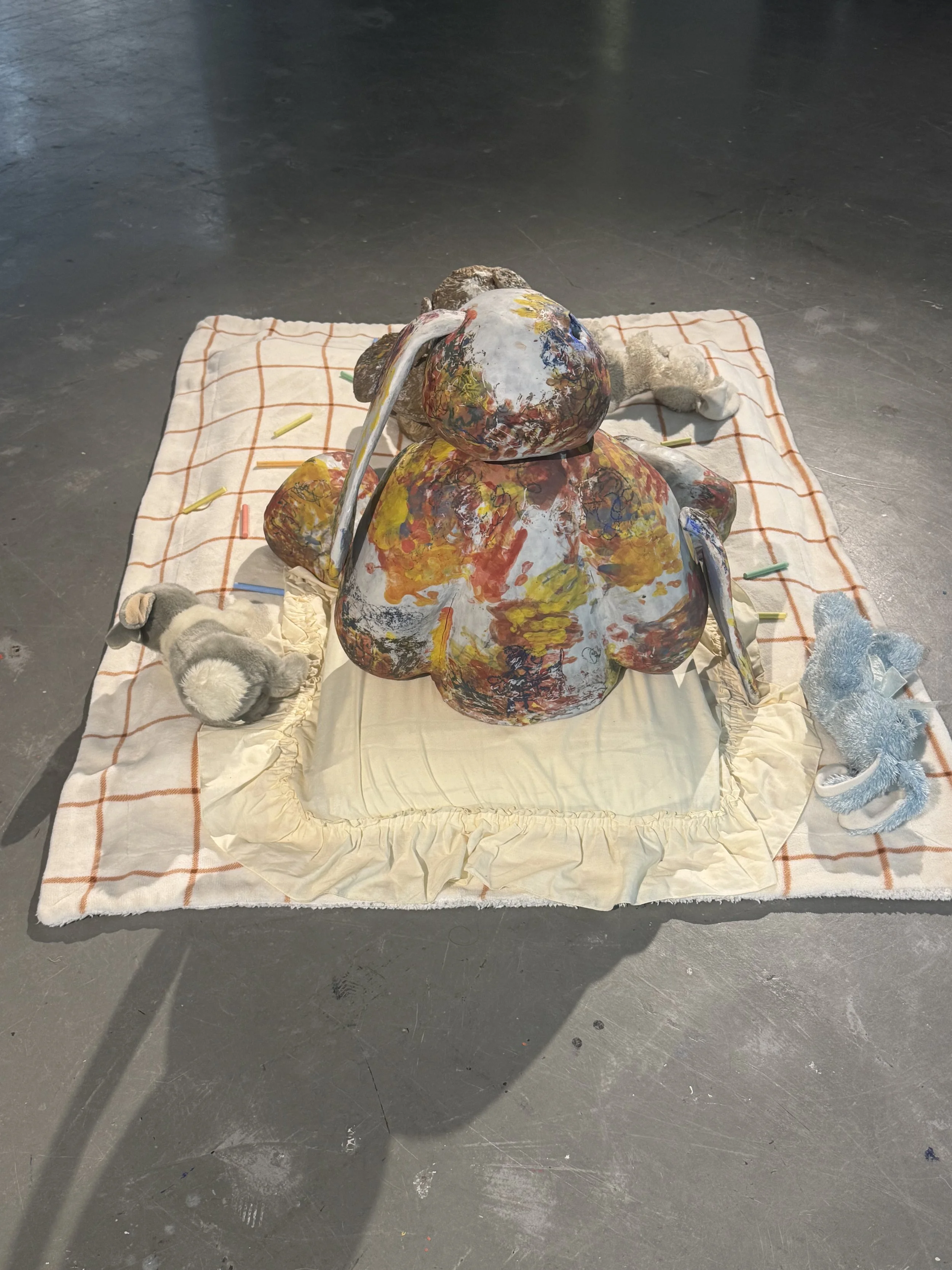 "Repatching My Inner Childhood", 2025. 

Red stoneware clay, Porcelain slip, Underglaze paint and crayons.
22" x 24" and 14" x 8".                                                                
Preserving my precious childhood memories by repatching