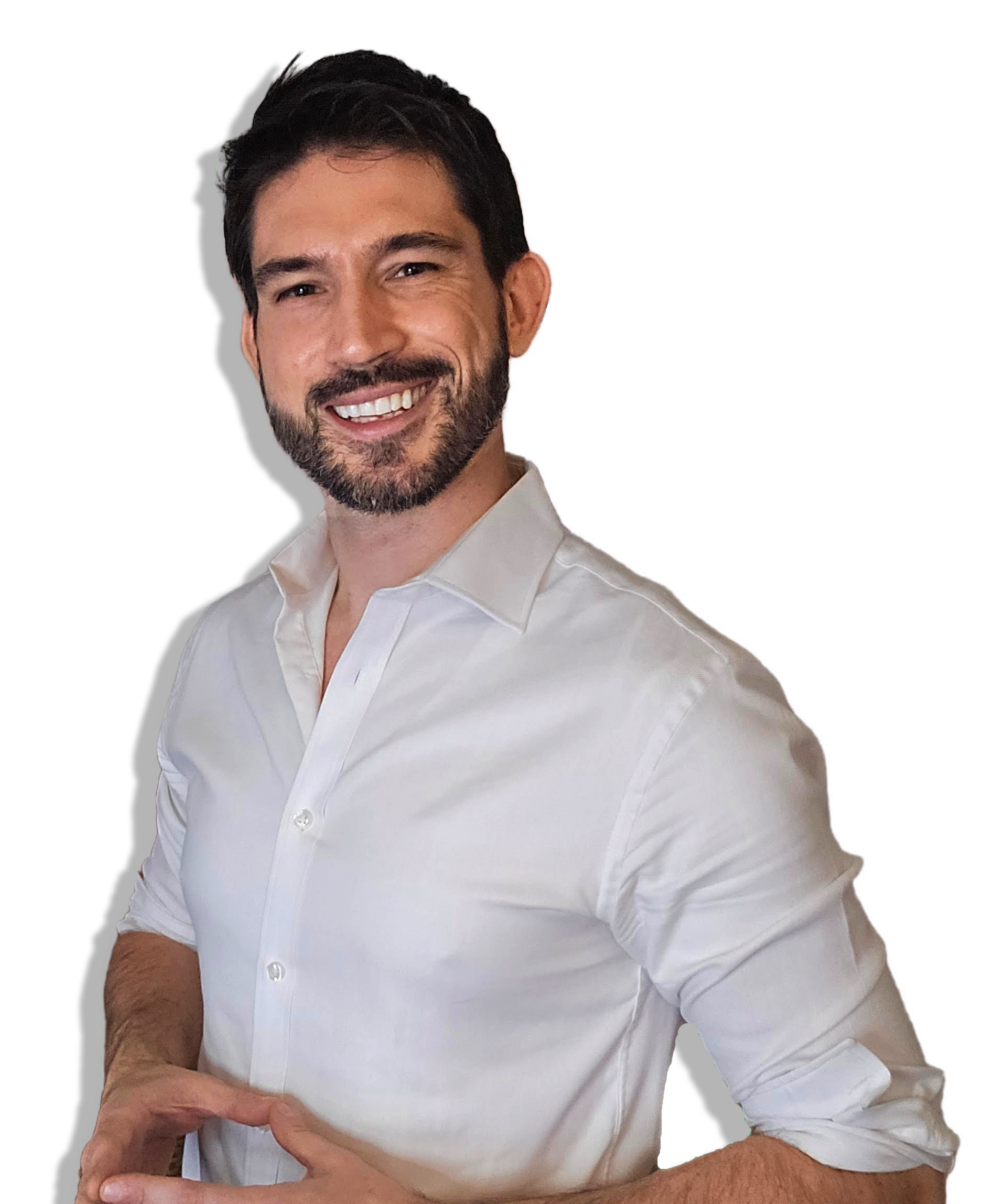 Andrej 2026 Los Angeles Mayor Candidate smiling with dark hair and a beard, wearing a white button-down shirt, standing