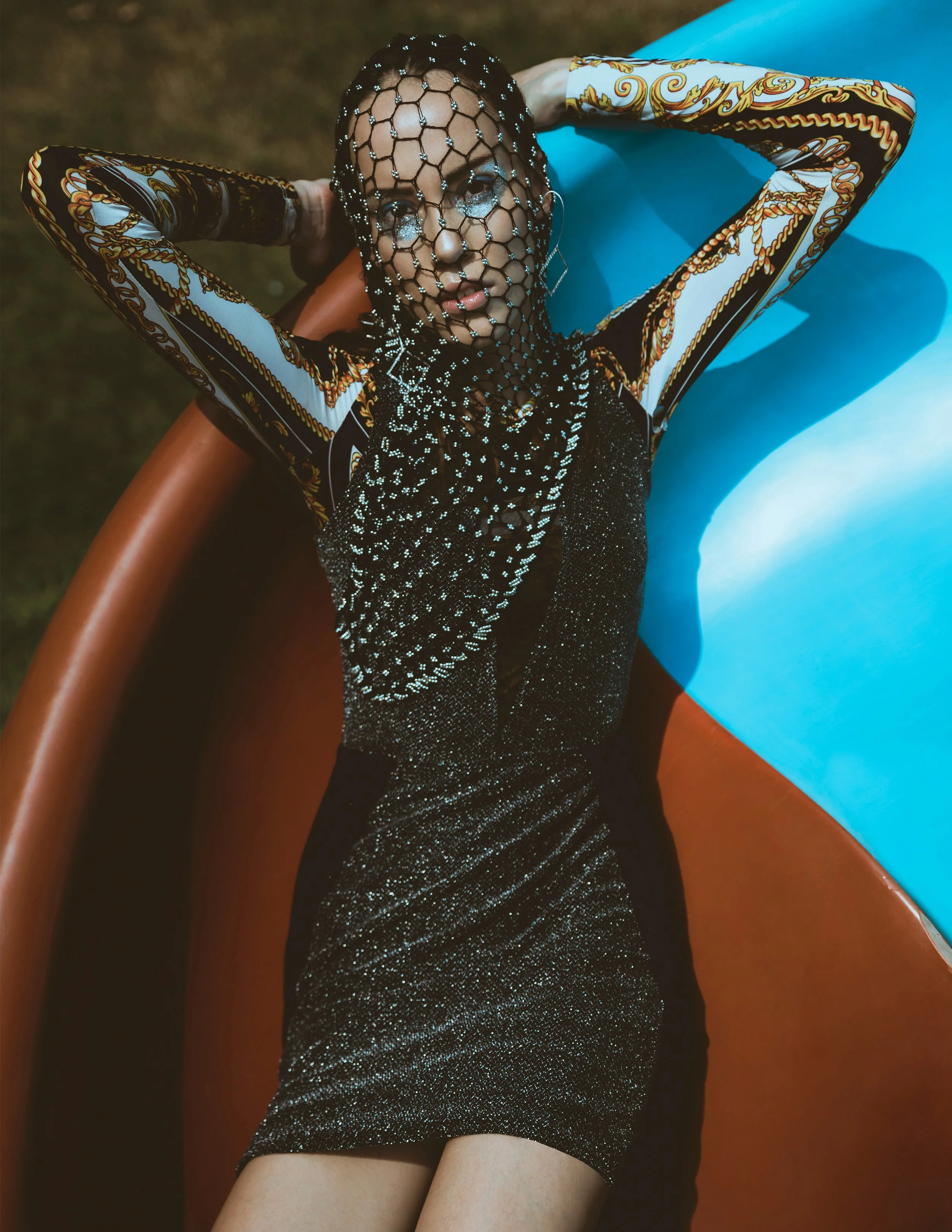  Wardrobe Credits:   Metallic Paneled Bodycon- Parisian  Footwear - Zara  Medallion Bodycon – Topshop  Earrings - Livy  Headgear by Henna Parimoo 