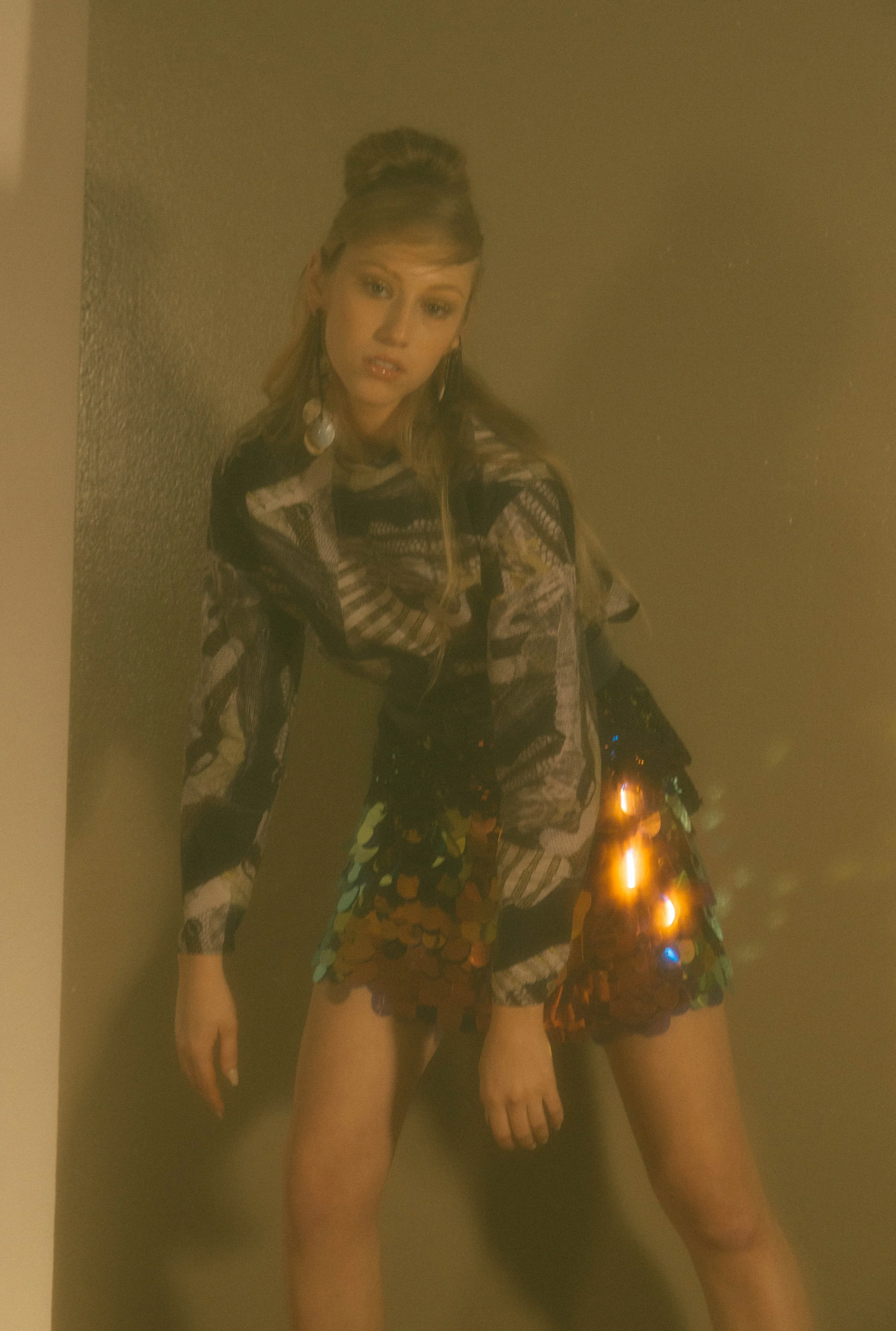  Wardrobe Credits:  Pattern long sleeves top/ JNBY Skirt/ Urban Outfitters Boots/ Zara Socks/ Stylist own Ear piece/ Qin Xu Earrings/ H&amp;M 