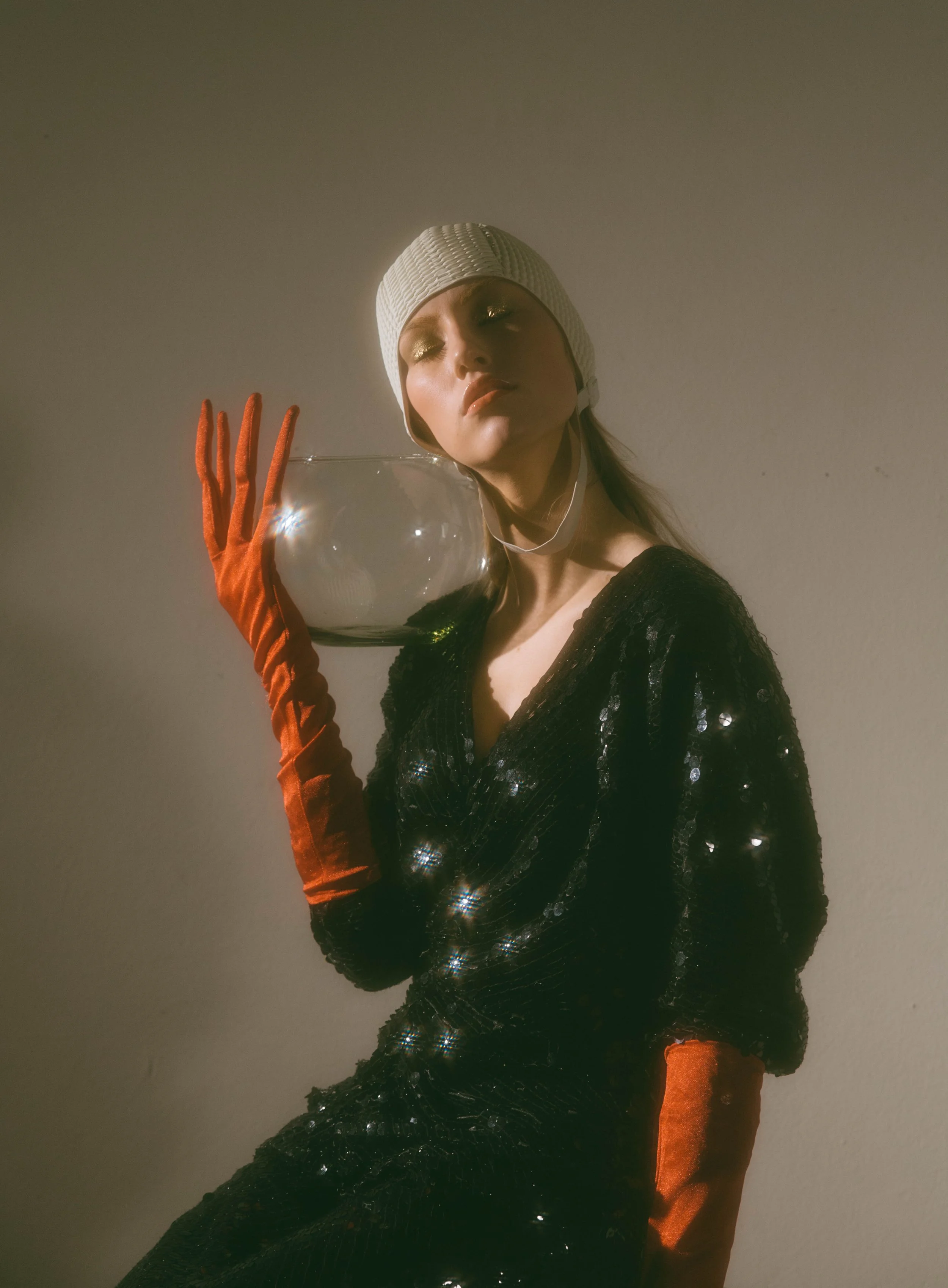  Wardrobe Credits: Long dress/ Stylist own Skate Swim bathing caps/ Beemo Red gloves/ Stylist own 