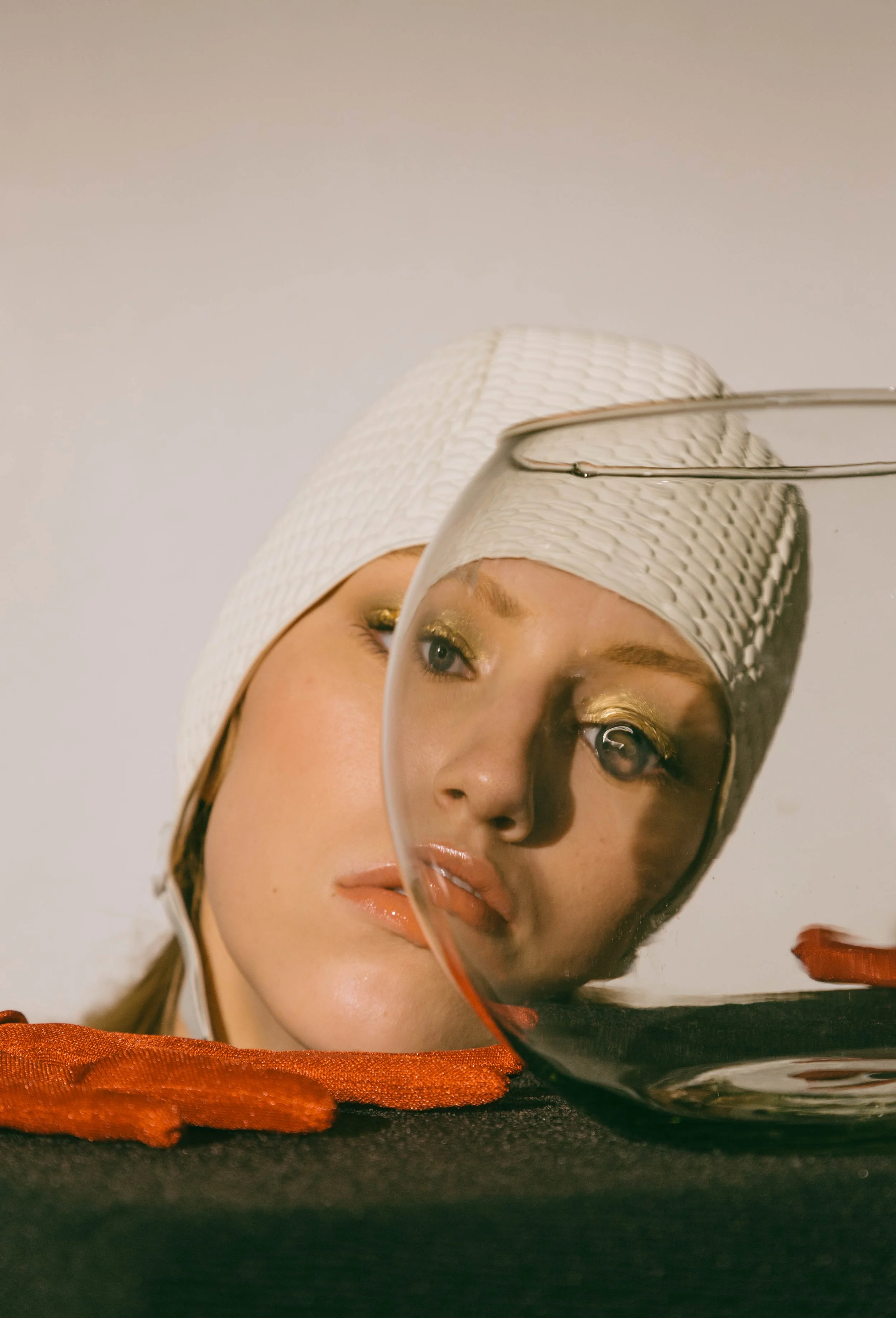  Wardrobe Credits: Skate Swim bathing caps/ Beemo Red gloves/ Stylist own 