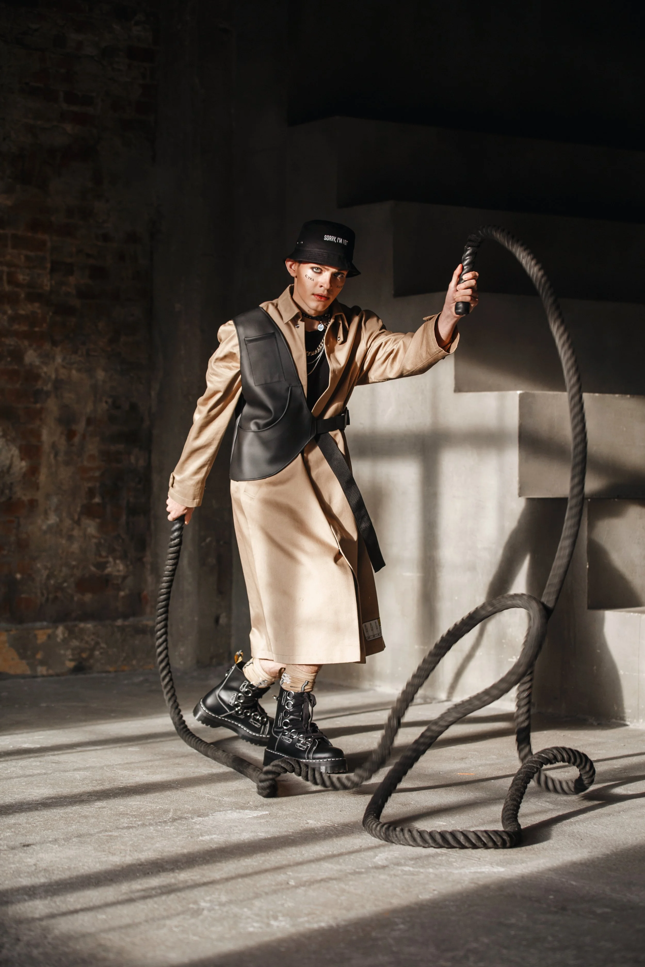  Photographer: Nadya Meleshko  Model: Ilya Chernobavskiy  Wardrobe Stylist: Dolinskaya Diana  Make-Up Artist: Regina Yagofarova    Wardrobe Credits:  Hat Sorry I’m Not  T-shirt NTMB  Coat and socks Volchok  Bag Fasterisque  Shoes Dr. Martens  Leather