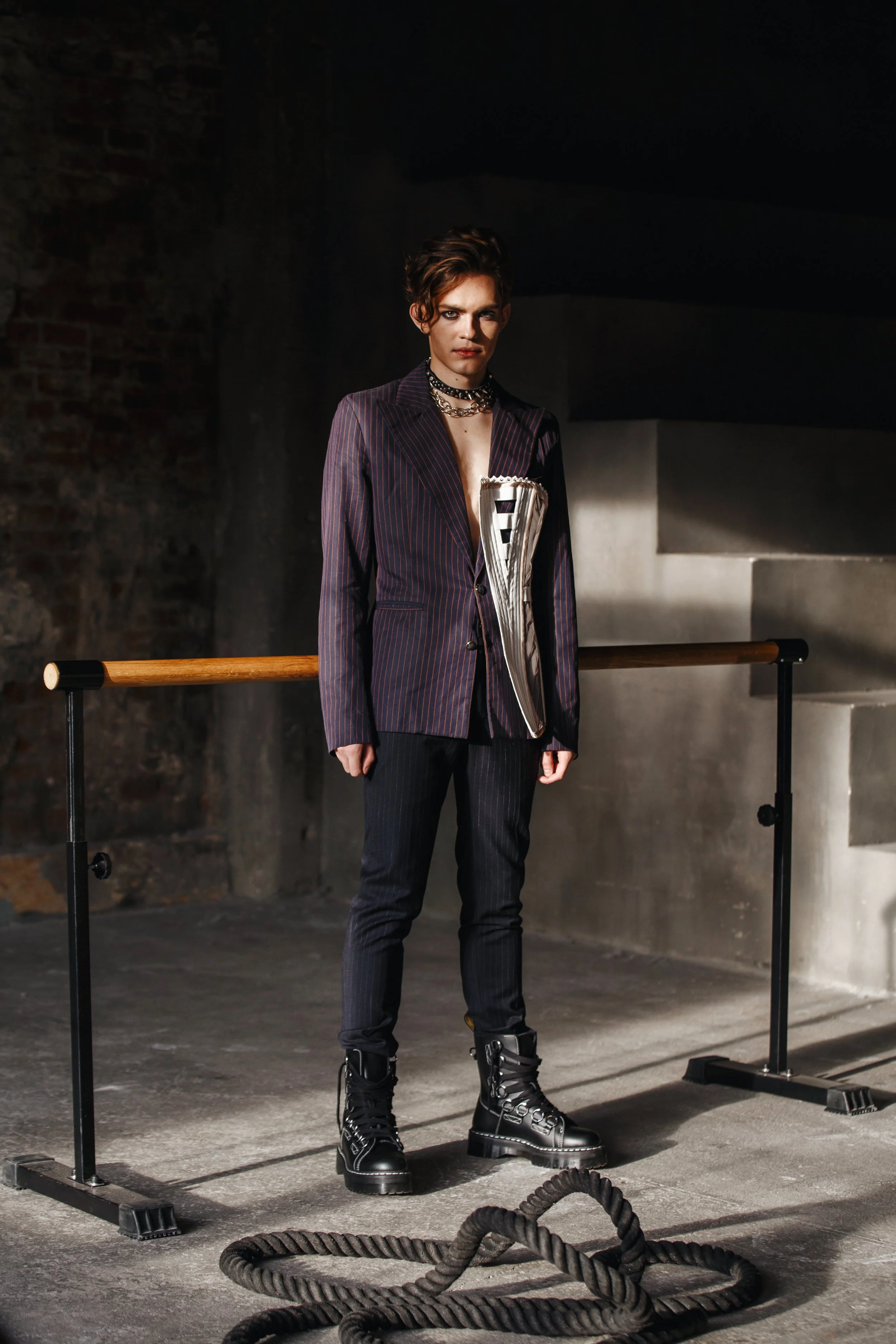  Photographer: Nadya Meleshko  Model: Ilya Chernobavskiy  Wardrobe Stylist: Dolinskaya Diana  Make-Up Artist: Regina Yagofarova    Wardrobe Credits:  Jacket Voronina Ekaterina  Trousers IRO  Collar Vivienne Westwood  Shoes Dr. Martens 