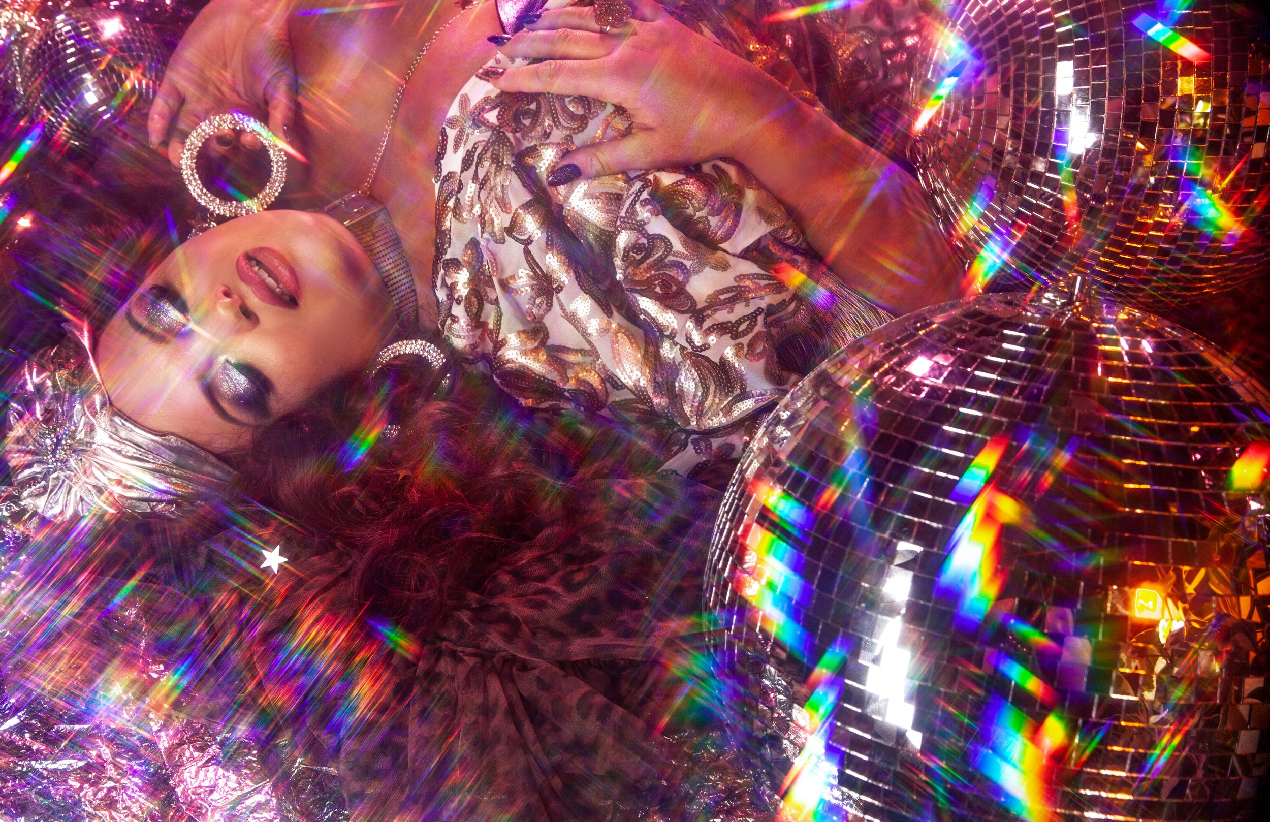  Photography by Susan Grace Hinman  Model: Georgina Horne  Creative Direction: Lucy Eversden  Makeup: Charlotte Amelia    Wardrobe featuring designs by Playful Promises, Unmentionables Lingerie, and The Burlesque Society, with accessories by PicaPica