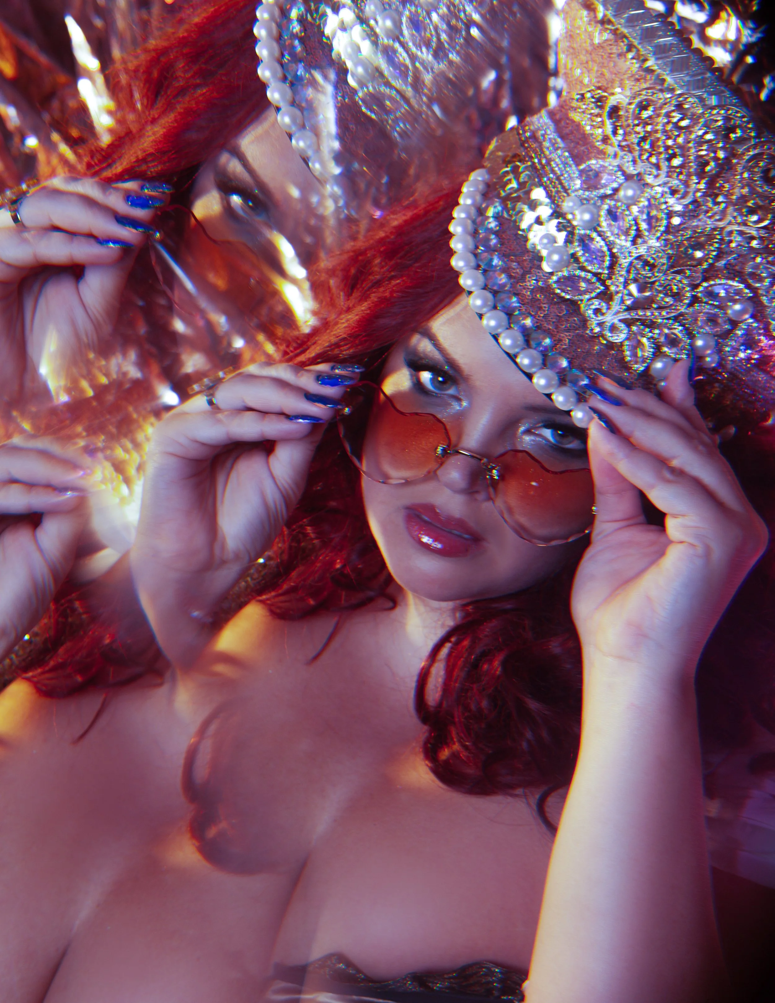  Photography by Susan Grace Hinman  Model: Georgina Horne  Creative Direction: Lucy Eversden  Makeup: Charlotte Amelia    Wardrobe featuring designs by Playful Promises, Unmentionables Lingerie, and The Burlesque Society, with accessories by PicaPica