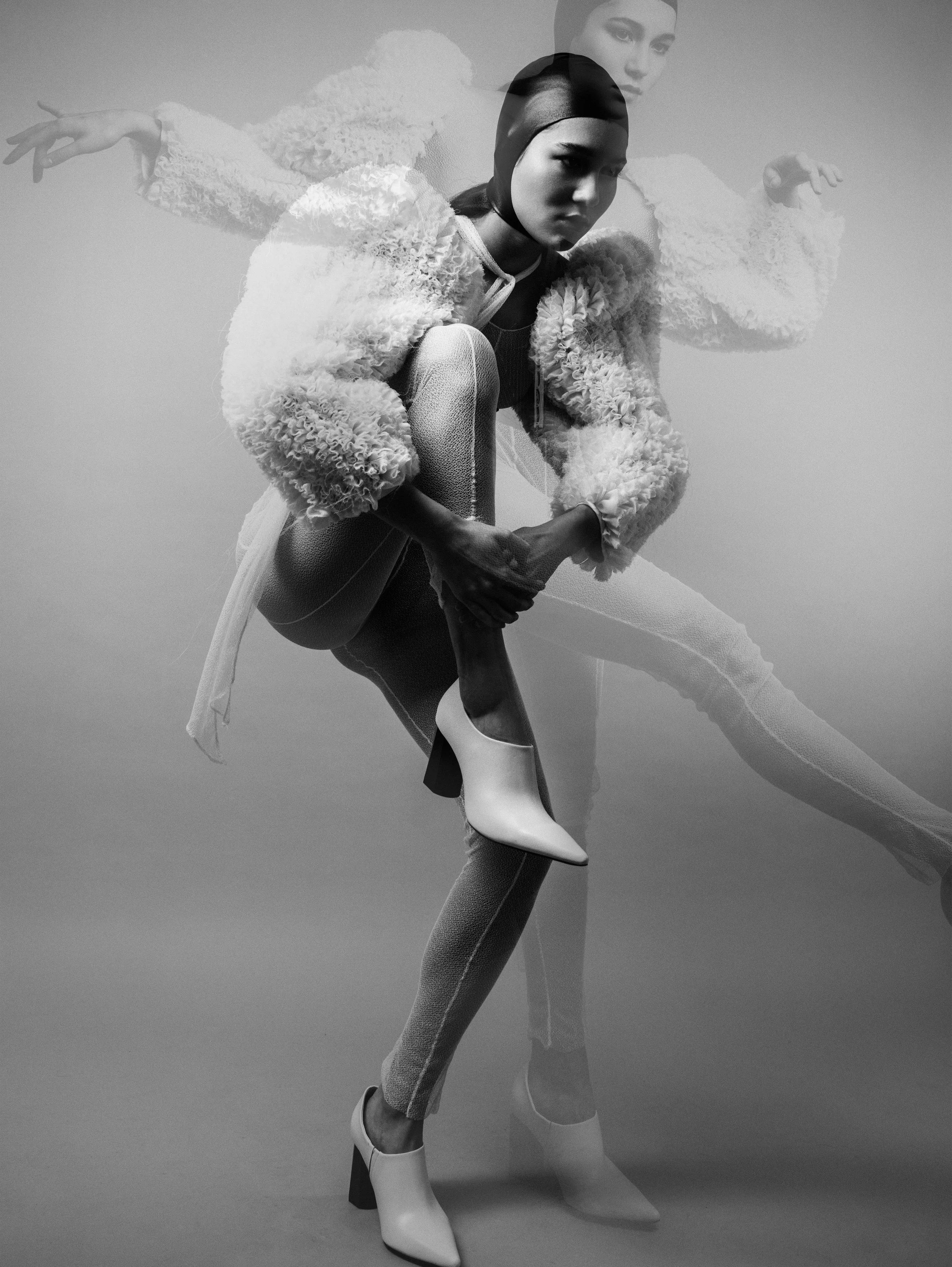  Designer  Jessica Walter    Wardrobe Credits  Transparent catsuit with ruffled puffed sleeves  Black corsage with white stitches 