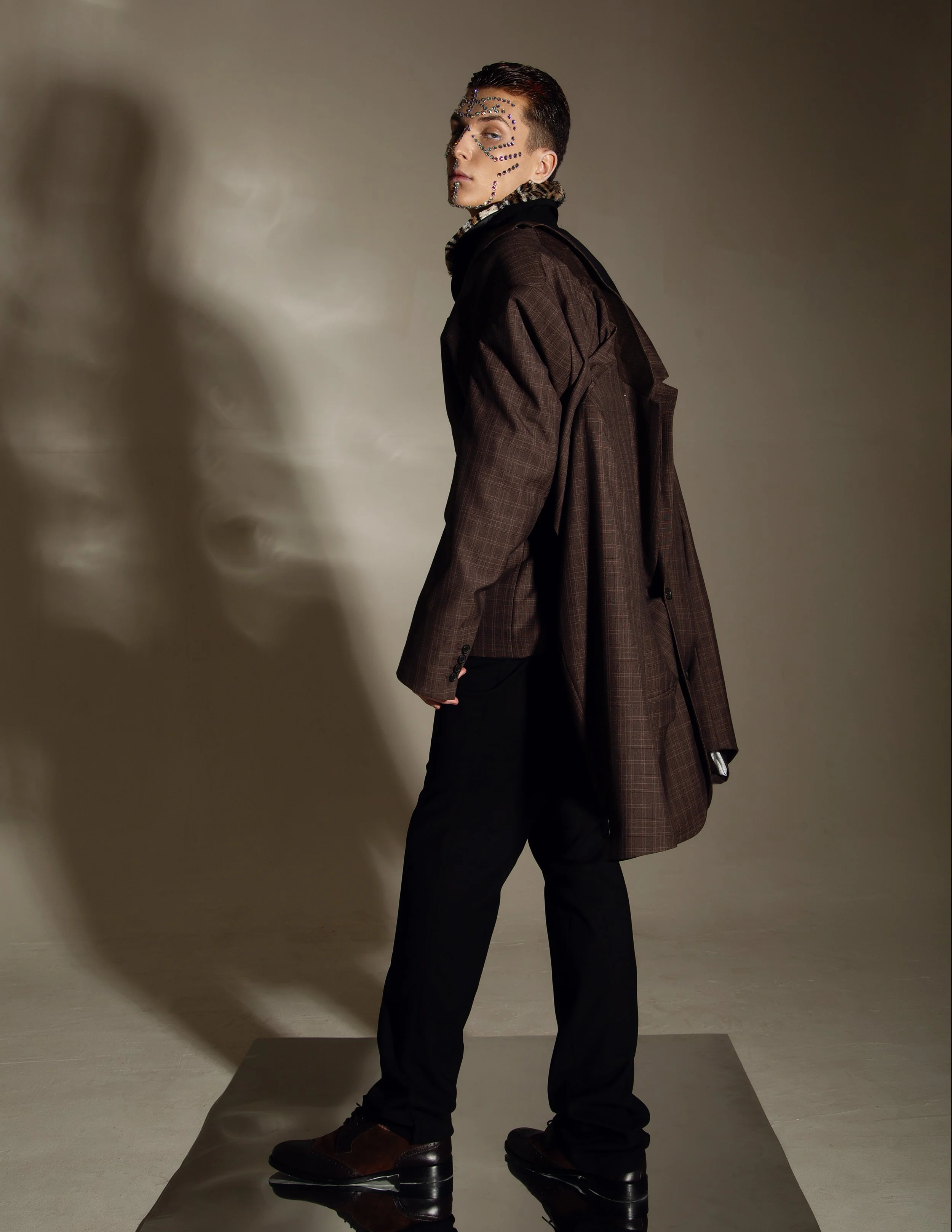  Photographer: Victoria Tretiachenko  Model: George Luzanov  Stylist: Lubov Troepolskaya  Makeup Artist: Anna Meshkova    Wardrobe Credits  Suits: PatrikMan    Jackets: PatrikMan    Shirts: PatrikMan    Pants: PatrikMan    Half-hose: Calzedonia    Sh