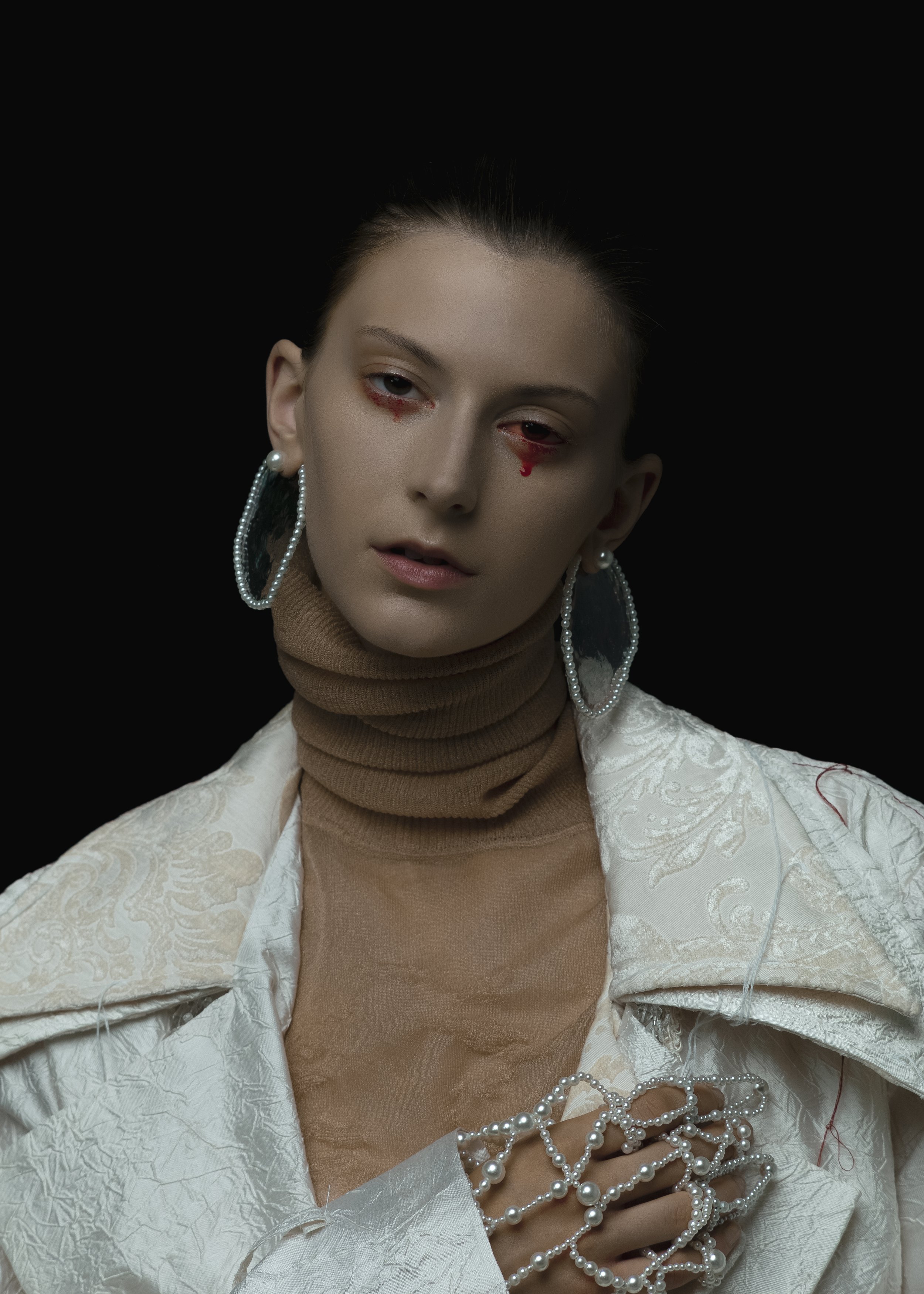  Photographer: n  Model: Julia Lucia  Makeup Artist: Mitch Yoshida  Hair Stylist: Yu Nakata    Wardrobe Credits:  Top / Bottom: Randy Wong  Jewellery: Mona Liu 