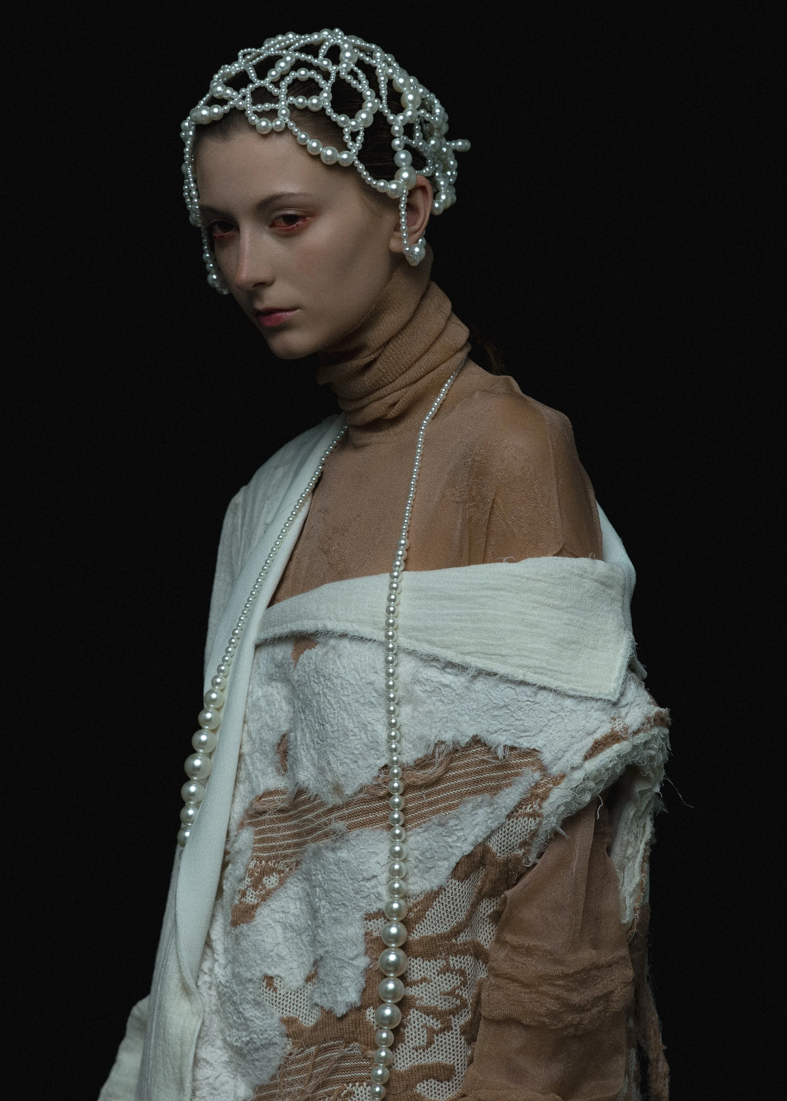  Photographer: n  Model: Julia Lucia  Makeup Artist: Mitch Yoshida  Hair Stylist: Yu Nakata    Wardrobe Credits:  Top / Bottom: Yayi Chen  Jewellery: Mona Liu 