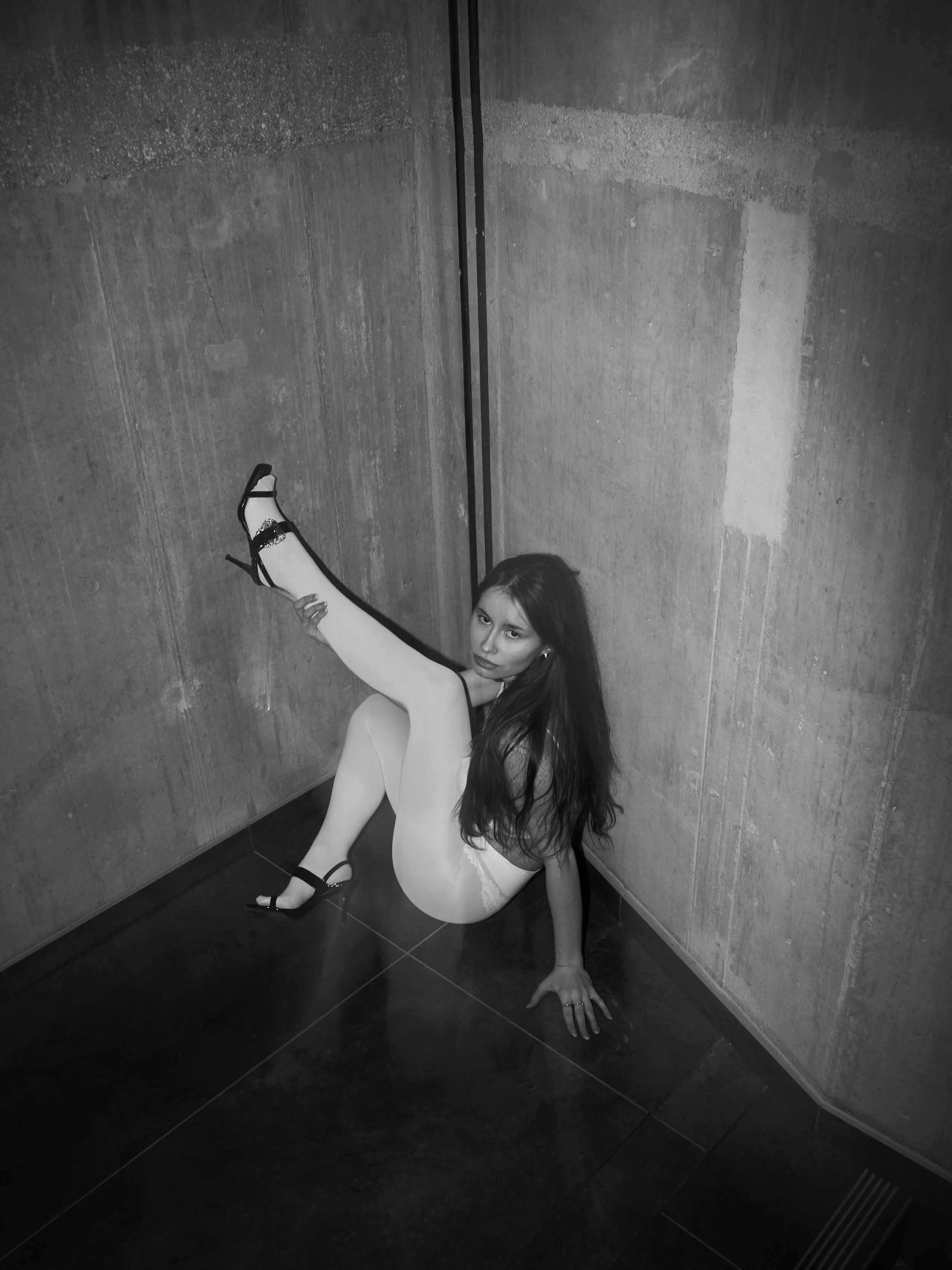  Photographer: Paul  Female Model: Hanna    Wardrobe Credits:   Coat: Zara  Top: H&amp;M   Tights: Calzedonia   Lingerie: Victoria's Secret  Shoes: Massimo Dutti 