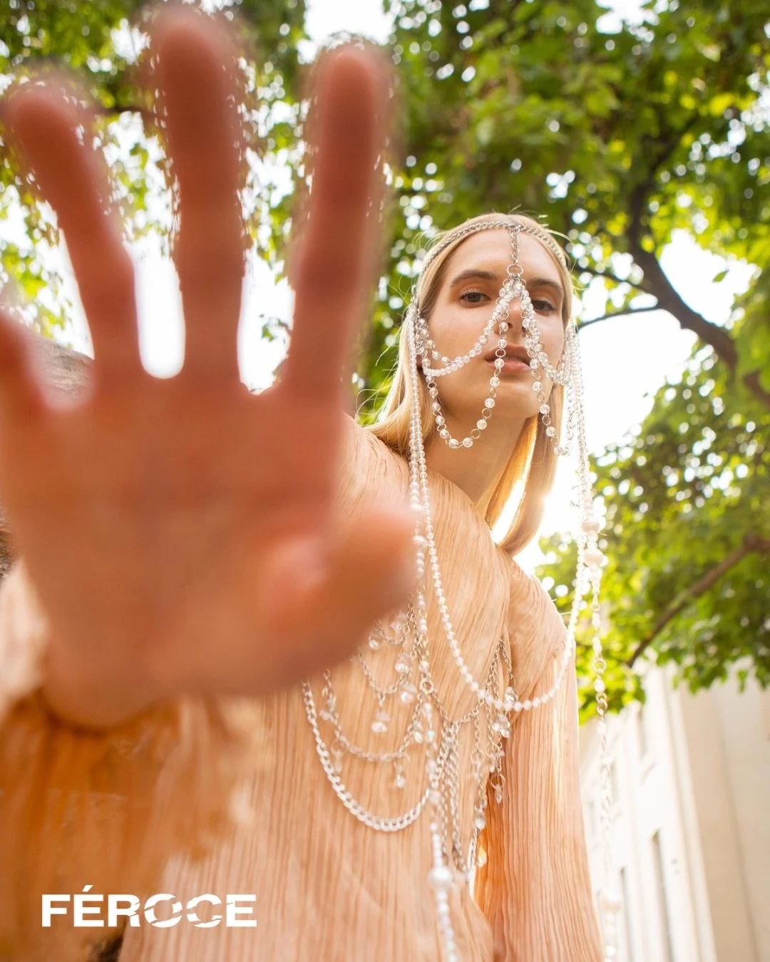  Photographer: Silvia Piva  Model: Livia Murvai  Makeup Artist: Francesca Rezzola  Wardrobe Stylist: Laura Maria Tonelli    Wardrobe:  Dress:  Ar.Ma.Cre.Se ‍  ‍  Skirt: Patrizia Pepe    Head piece: Martina Vega    Chain bra: Martina Vega 