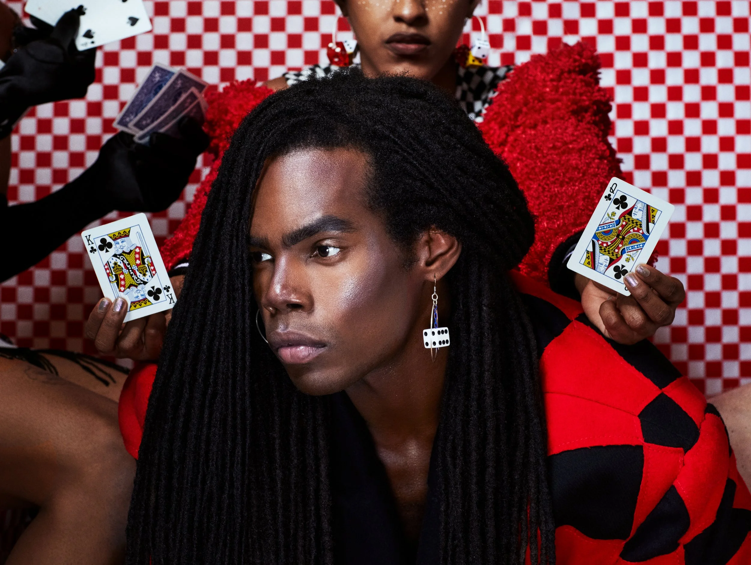  Photographer: Steven Warren      Model: Eric Ellison    Patchwork checker wool coat      Model: Jewell Jones    Red furry bomber      Makeup Artist: Amirah Stone    Fashion Designer: Zoe Grinfeld    Wardrobe Stylist: Brandon Foster   