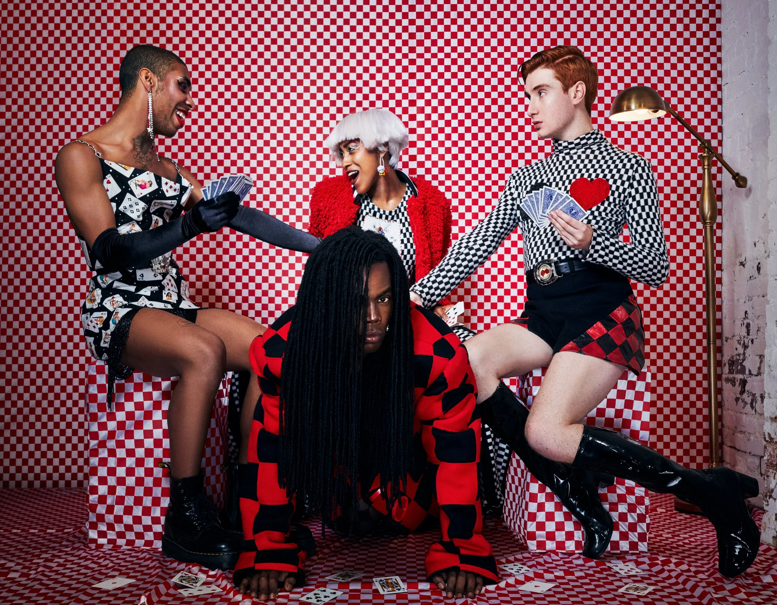  Photographer: Steven Warren      Model: Eric Ellison    Patchwork checker wool coat      Model: Dash Katz    Checker knit turtleneck with beaded playing card patches, black wool shorts with checker leather inserts      Model: Jewell Jones    Checker