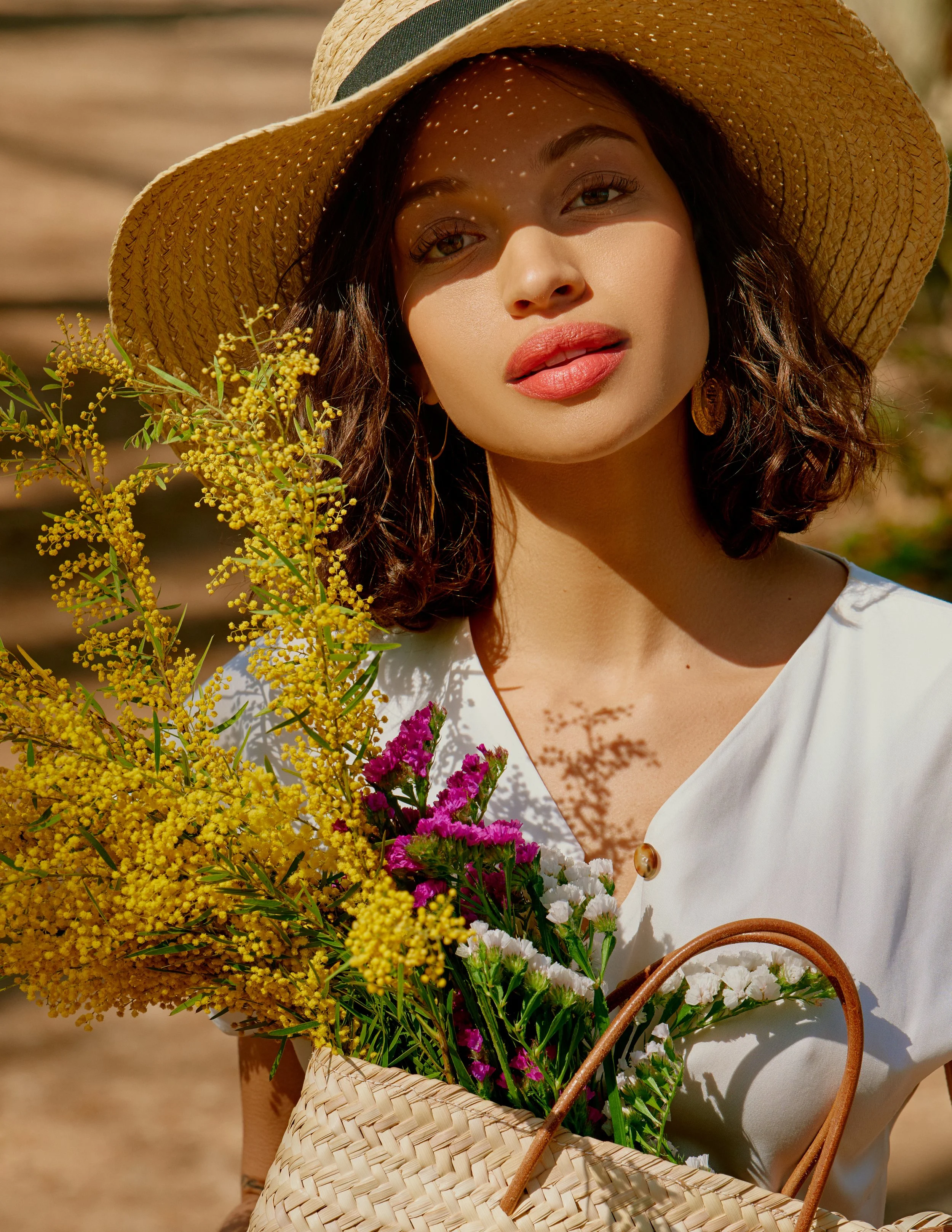  Photographer: David Garcia  Model: Sabrina Sancler @ Lenis  Makeup Artist: Vanessa Crespo  Wardrobe Stylist: Aina Caballero  Assistant: Mike F. Pamphile    Suit: Diarte  Top: H&amp;M  Bag: Santapalma  Earrings: Talantha  Belt: Salsa  Sandals: Corina