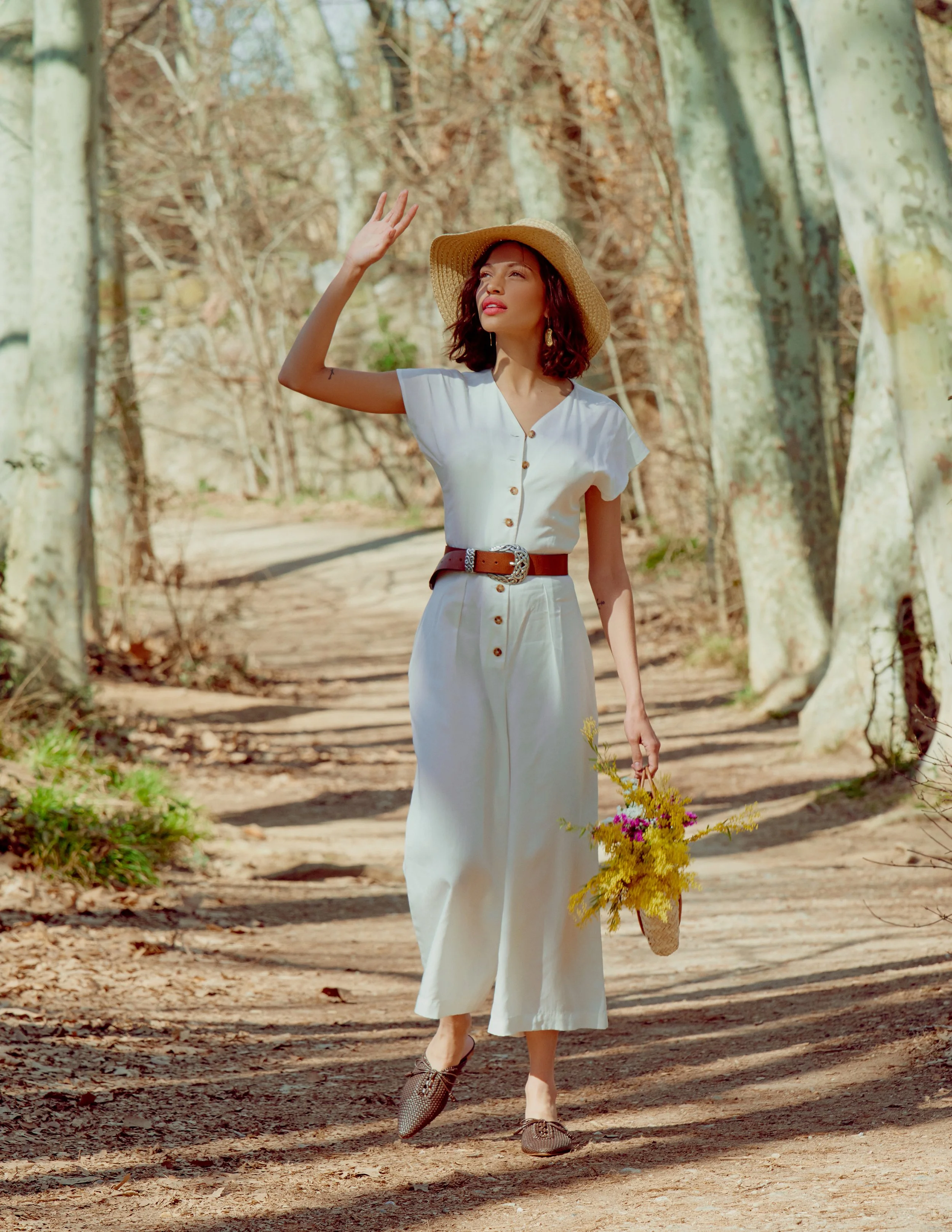  Photographer: David Garcia  Model: Sabrina Sancler @ Lenis  Makeup Artist: Vanessa Crespo  Wardrobe Stylist: Aina Caballero  Assistant: Mike F. Pamphile    Suit: Diarte  Top: H&amp;M  Bag: Santapalma  Earrings: Talantha  Belt: Salsa  Sandals: Corina