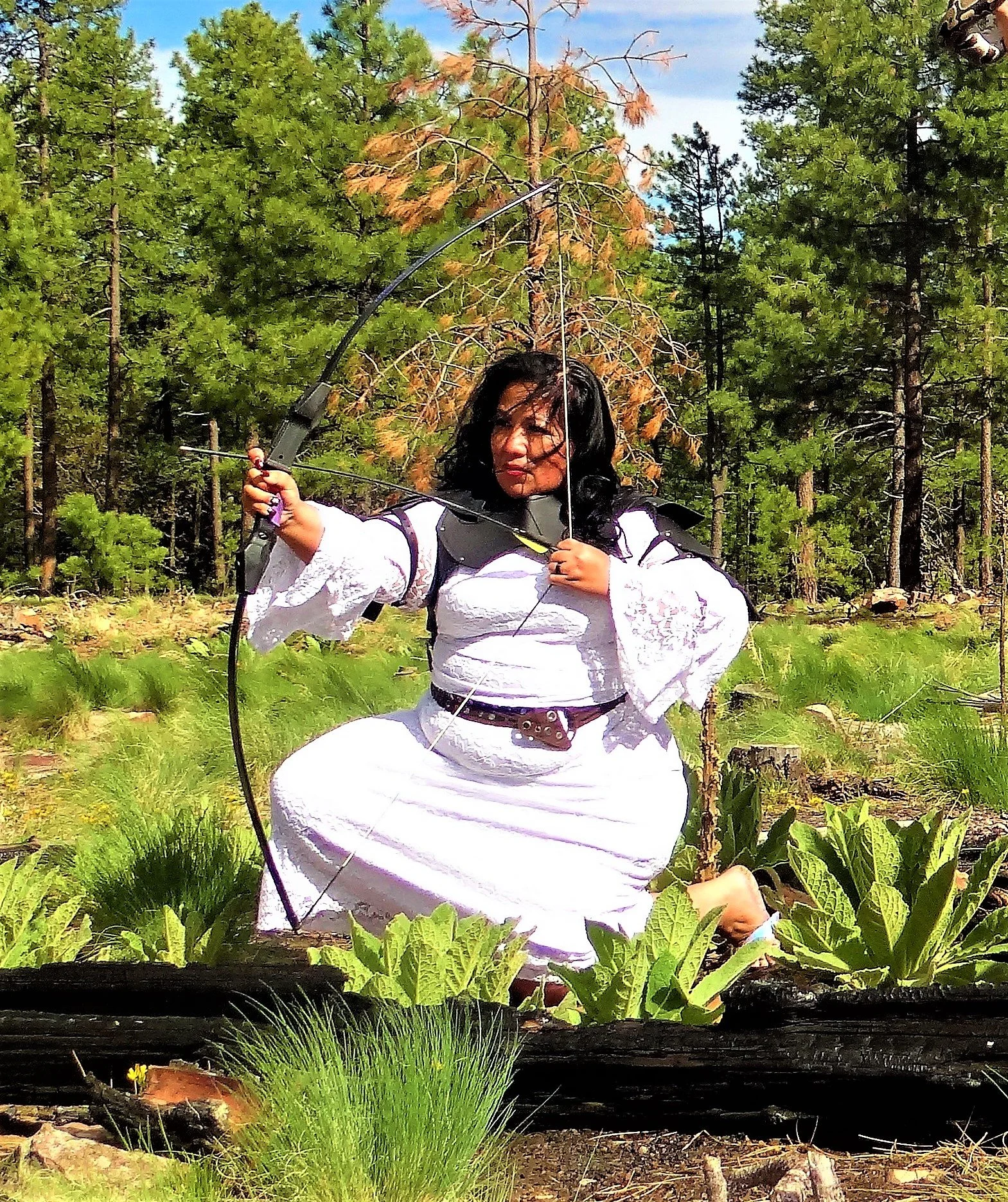   She draws a deep breath with her loving strength pulling passion with every arrow she throws for the valley below.  She fights the battle to restore the faith and trust with loving light and a lil bit of pixie dust to the trees, the wind, and the s