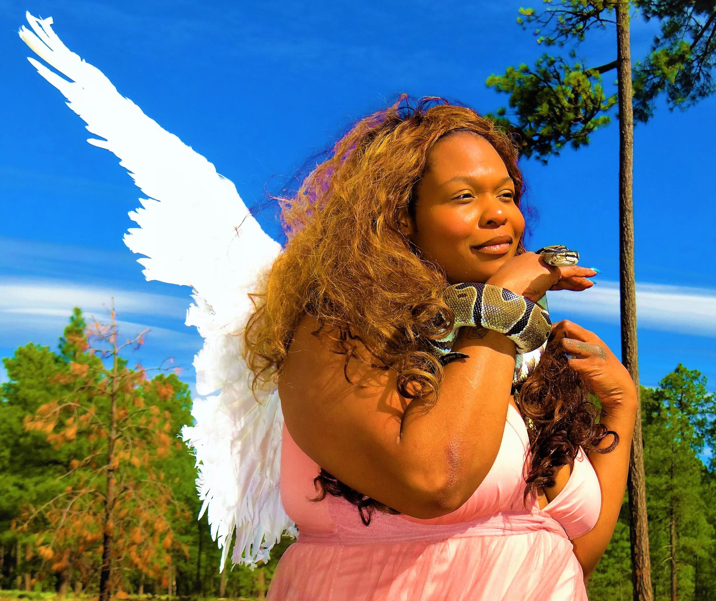 She breathes in hope, faith, trust with the creatures and  breathes out with the wind song of promising new beginnings.  She is Mother Nature, a blessing.