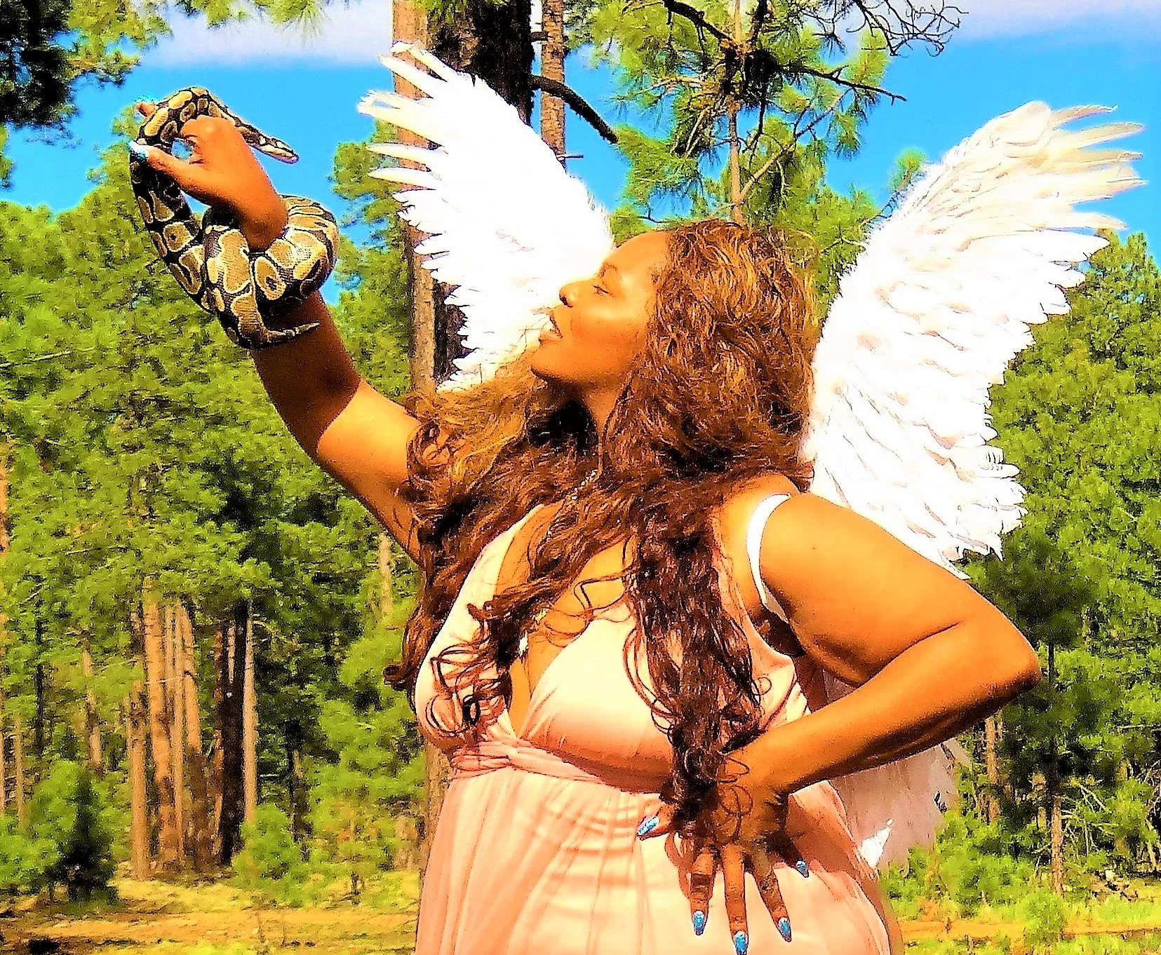   A calm stills the forest as she sets her gaze on the bewildering creature of distrust.  Without taking a chance on his charm she may never have known his gift of pure love.  For it was he who brought her gift of pure loves white light     Photograp