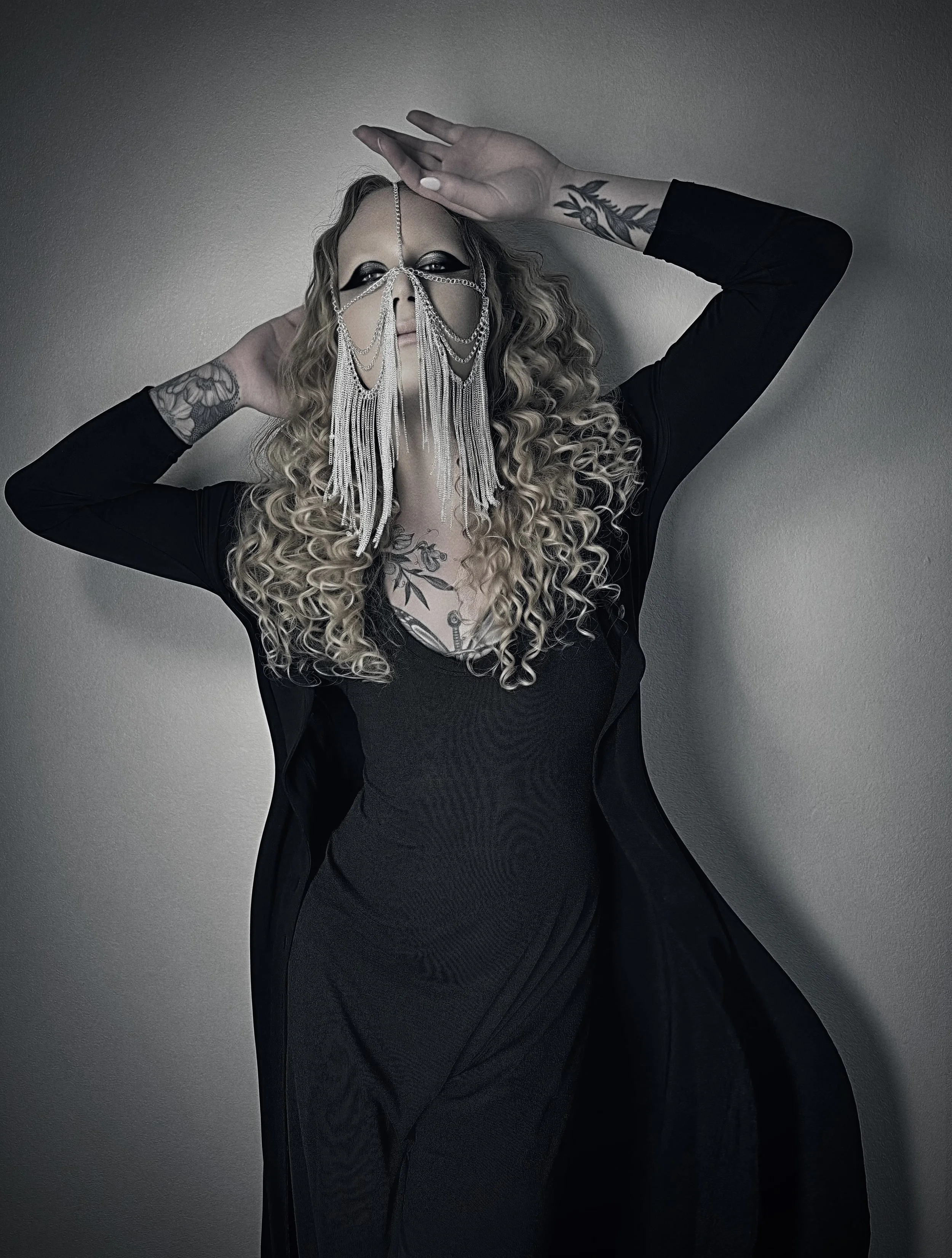   Jacket: Ungaro    Dress: Vintage    Jewelry: Black Tulip Antiques Fashion Archive  