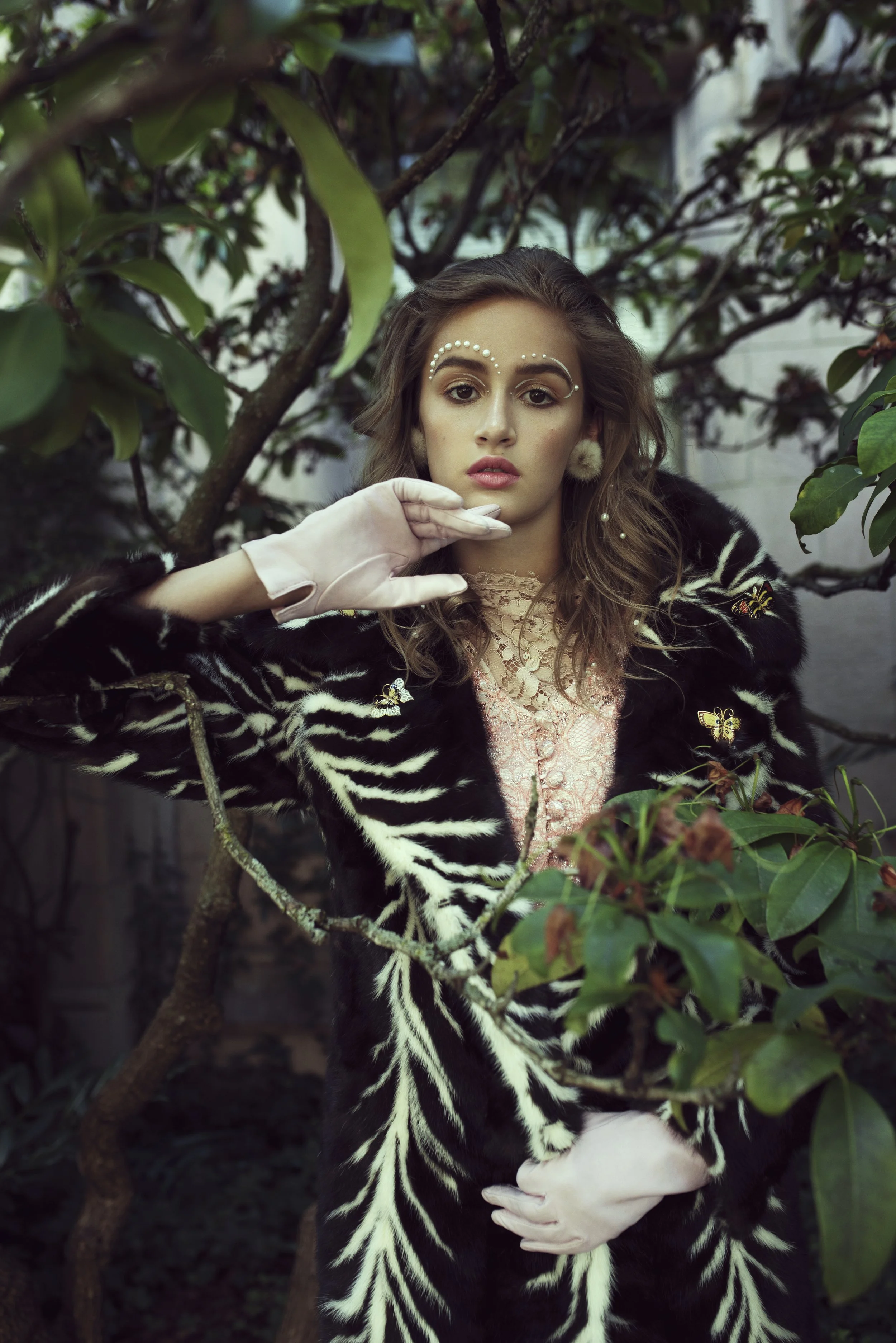   Wardrobe Credits    Earrings - Stylist's Own - Mink Fur Earrings from the 1930s Necklace - Stylist's Own - Gold Swan Necklace Gloves - No Label - Pink Leather Gloves courtesy of Red Light Vintage Broaches, worn on Fur Coat - All Stylist's Own - Bla