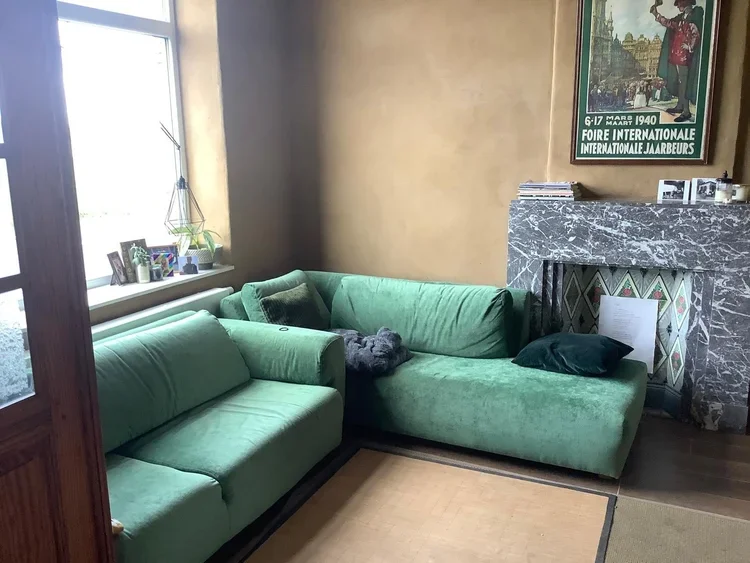 Woonkamer met natuurlijke leemstuc in Pellenberg