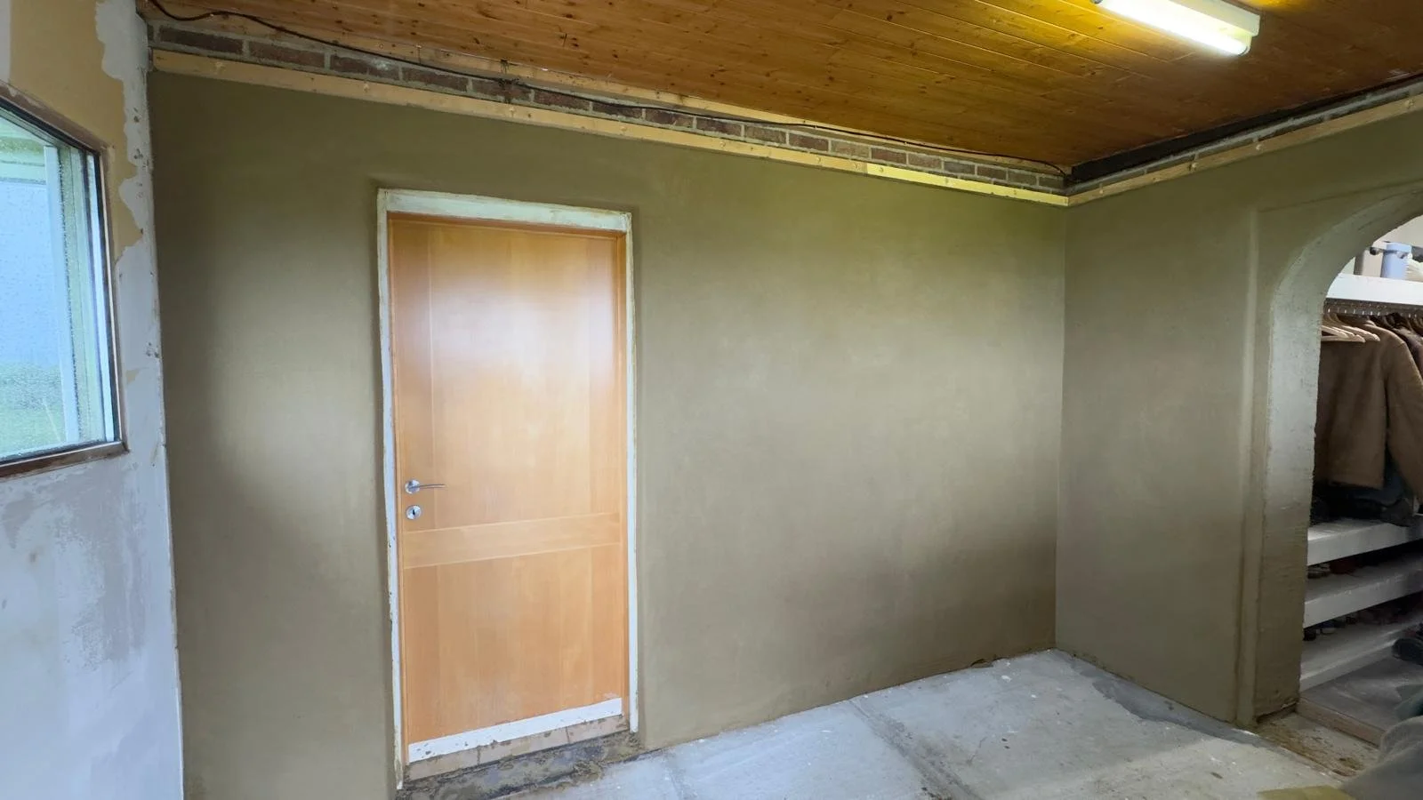 Woning afgewerkt met natuurlijke leemstuc in Glabbeek