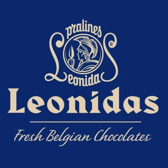 Logo for Pralines Lebanon Leonidas featuring a profile of a warrior with a helmet and spear, and text indicating they sell fresh Belgian chocolates.