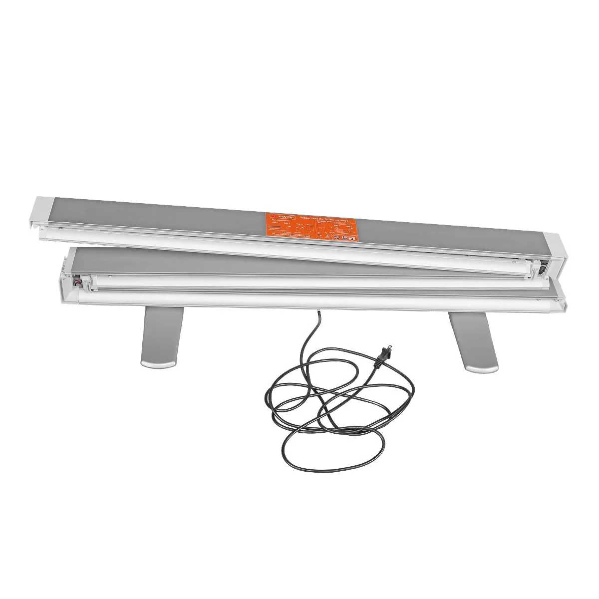 A rectangular medical examination or therapy light with metallic body, adjustable arms, and a power cord, viewed from below.