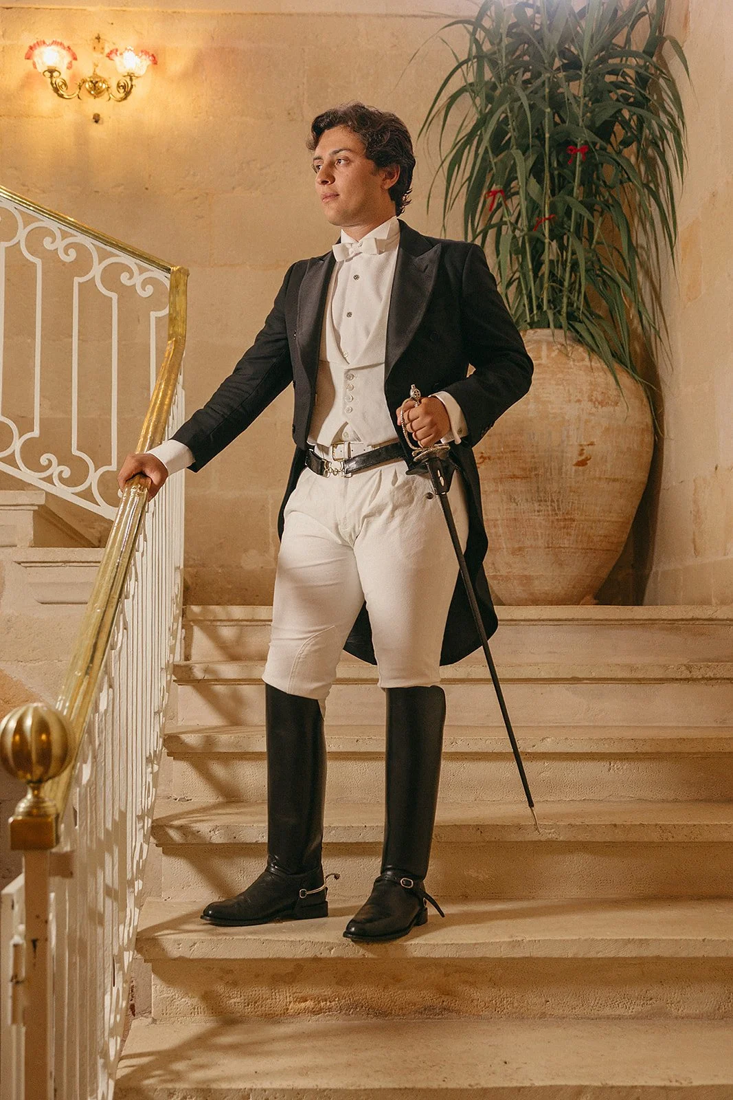 Caixer Senyor posing on the steps of the Palau in Ciutadella during Sant Joan festival, Menorca