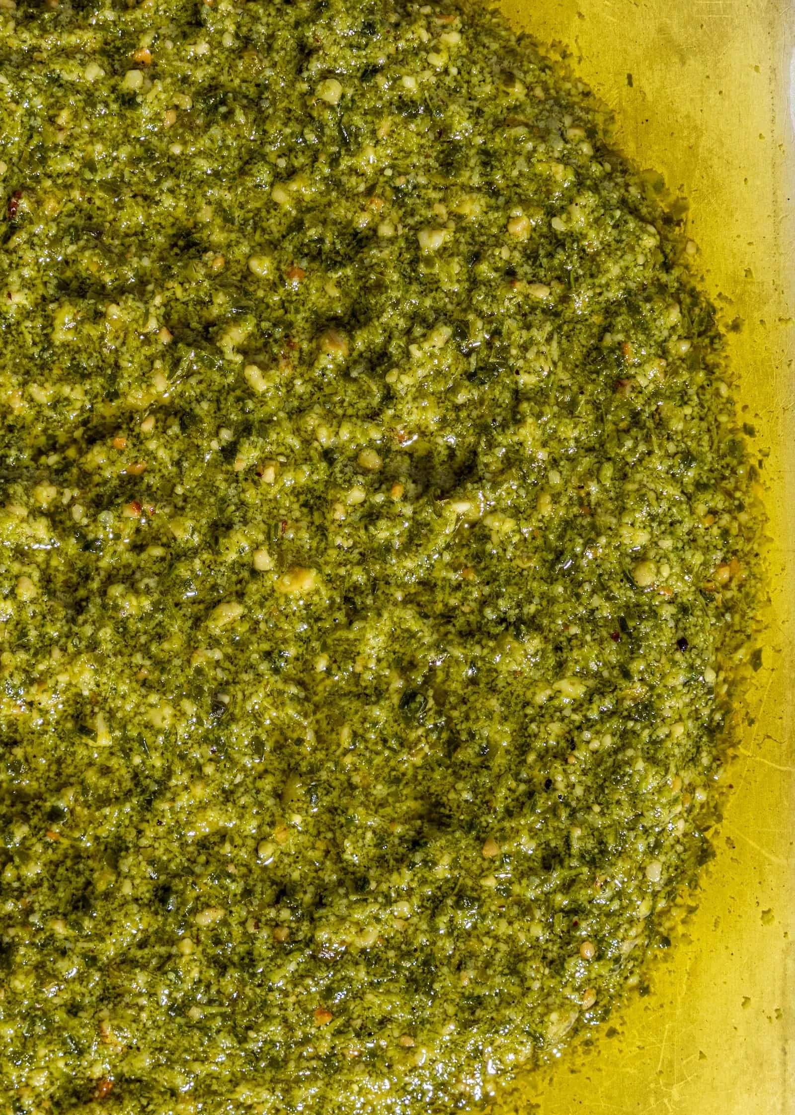 Close-up of green nut free pesto.