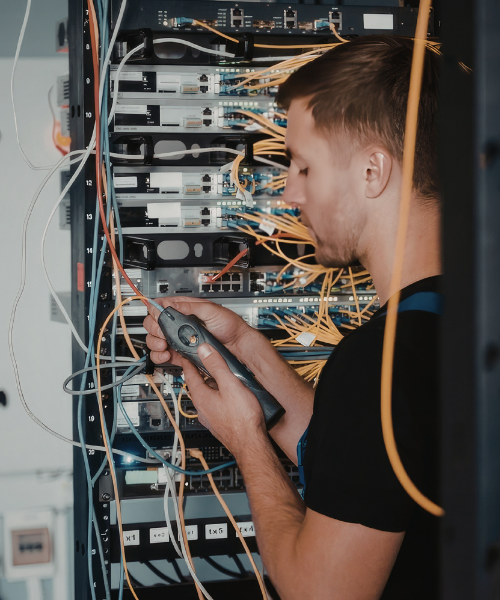 Core 1 IT Solutions field technician performing onsite hardware diagnostics and network support for organization with infrastructure in Philadelphia PA